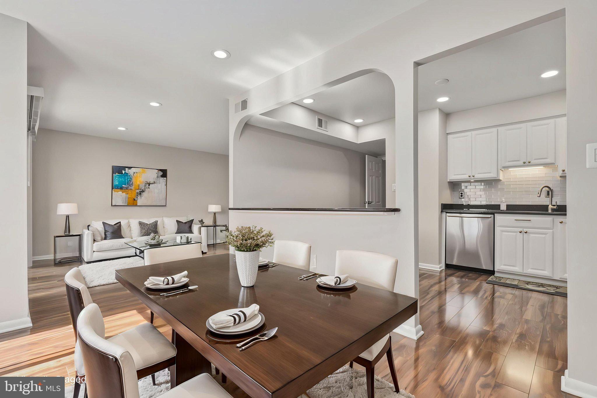 Beautifully updated and move-in ready condo featuring stylish renovations throughout and a peaceful balcony overlooking the courtyard. This well-maintained home offers hardwood laminate flooring, a fully renovated kitchen with updated cabinets, countertops, and appliances, plus a new washer and dryer. Bathrooms have been tastefully updated, and the entire unit has been freshly painted for a clean, modern feel. Additional upgrades include recessed lighting and an upgraded 100-amp electrical panel. Community hot water included. Shows beautifully and offers exceptional value with thoughtful updates and a bright, welcoming layout in a highly desirable setting. Eleanor Roosevelt High School, Metro station near by with bus route and hospital nearby