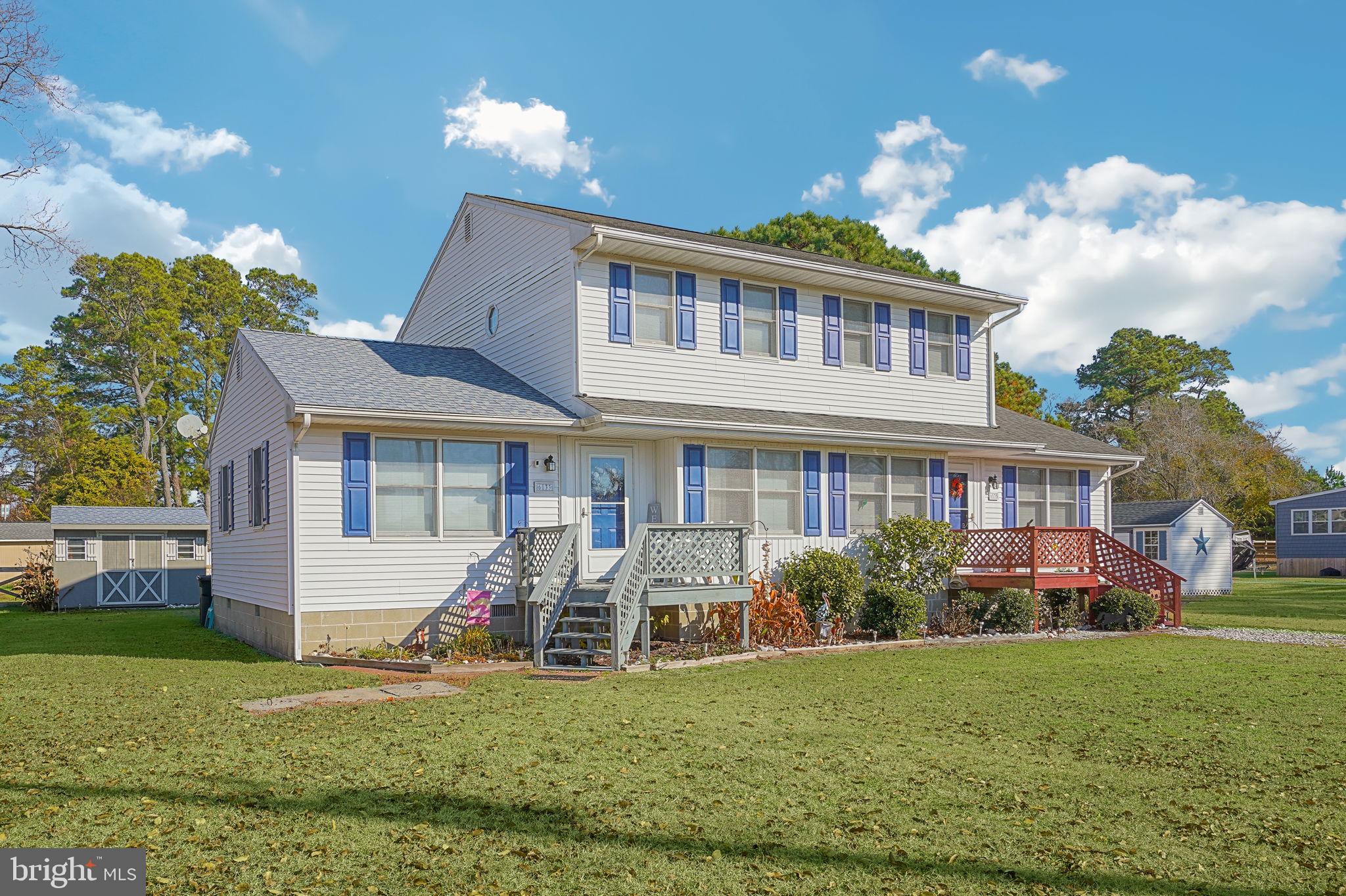 Step into a slice of paradise with this pristine island duplex situated on Chincoteague's peaceful east side. A rare gem on a tranquil dead-end street, this 3 bedroom, 1.5 bath residence is moments from essential amenities & coastal leisure, including shops, restaurants, the crabbing pier, boat ramp, bike trails, & the beach. Perfect as a permanent home, a holiday retreat, or investment option. The living room radiates comfort with its bright, spacious living area. Culinary activities become a delight in the well-sized eat-in kitchen, equipped with rich oak cabinetry and a practical pantry. Glass sliders beckon you to a lovely rear deck, offering a seamless indoor-outdoor interplay for entertainment or relaxation. A convenient powder room completes the ground level. Ascend to the serenity of the upper floor, where two additional cozy bedrooms await, accompanied by a full bathroom to serve family or guests. Outside, the property doesn't fail to impress with a handy storage shed, ensuring your living spaces remain uncluttered. This home's impressive maintenance record promises a move-in ready condition, providing peace of mind and the elusive turnkey lifestyle sought by many. Welcome home to coastal living, where every day feels like a holiday.