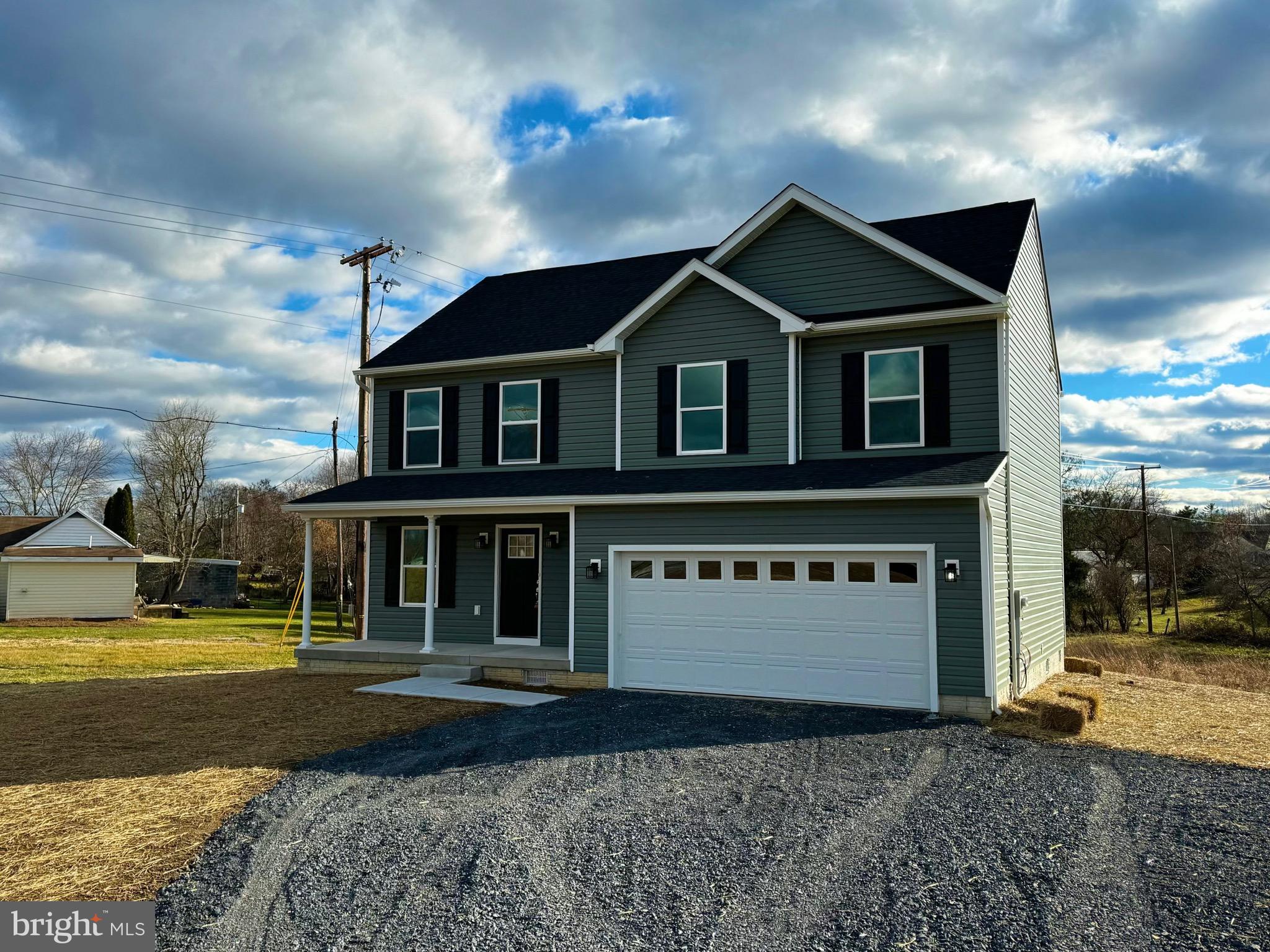 Wow! Don’t miss this opportunity to own this brand new home sitting on 0.34 acres of land. This beauty is finished and is ready for you! 4 Bedrooms, 2 1/2 baths, open kitchen with stainless steel appliances, granite countertops and island, large living rm, primary bedroom offers tray ceilings, primary bath huge shower with glass door and double vanity sinks, laundry is located on bedroom level with utility sink, dual heating and air, huge front porch and large concrete patio with fire pit perfect for gatherings! Call today this home will not last
