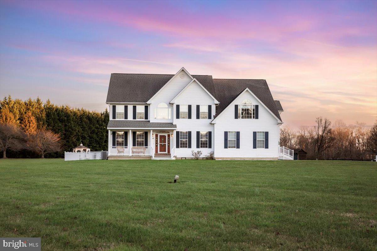 Welcome to this charming country haven. As you step through the grand 2-story entry foyer, you're greeted by a timeless parlor on one side and a formal dining room on the other, creating a warm and welcoming atmosphere.

Venture further in, and you will find a great room with soaring ceilings and graceful circle-head windows that fill the space with an abundance of natural light. The main level boasts a versatile bonus space, perfect for a second-floor bedroom, office, or whatever space you desire, with picturesque views of the backyard.

Prepare to be enchanted by the heart of the home...a gourmet kitchen featuring an oversized Viking gas cooktop with a griddle, a double convection oven, and a Sub Zero refrigerator/freezer. The lower level also houses a delightful sunroom overlooking the inviting pool. This sun-kissed space is conveniently connected to a full bath and laundry area, adding convenience to your summer pool days.

Upstairs, the Primary Bedroom suite awaits with its own elegant Main Bathing Suite. Attached to this sanctuary is a bonus room, ideal for a home gym, a glamorous room for self-care, or a quiet hideaway office. Additional bedrooms on this floor share a hall bath, while the extra-large fourth bedroom boasts its own ensuite bathroom.

Step outside to discover the beauty of the surroundings – two sheds for storage, a gazebo perfect for daydreaming, and a partially fenced yard for privacy and tranquility. This dream home truly has it all and then some, offering a perfect blend of sophistication and comfort in every detail.