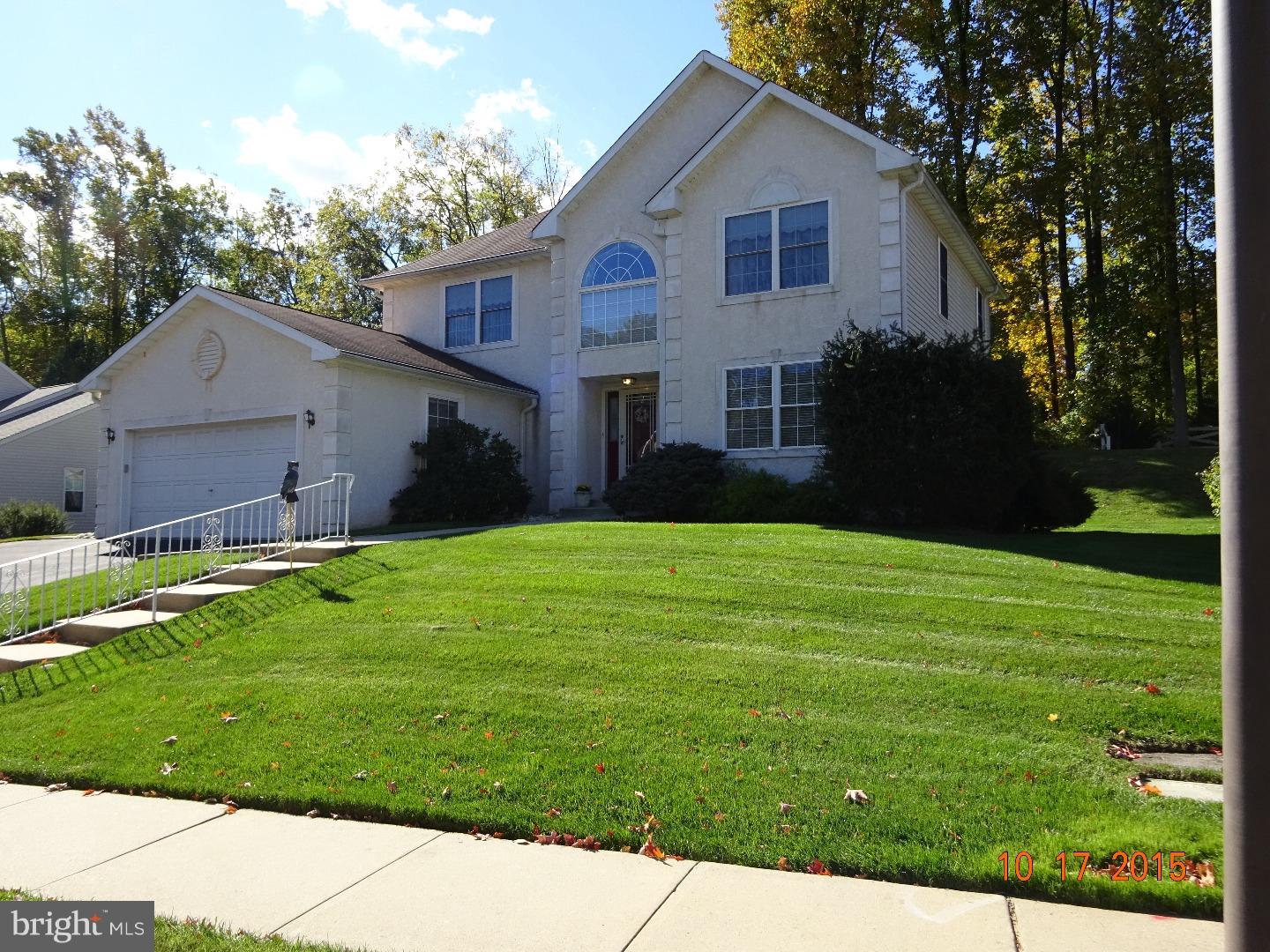 Don't miss this rare opportunity...a bright 4 bedroom, 2 1/2 bath single house in the most desired Hidden Glen community.  This home boasts a two story center hall foyer entrance with a formal living room, dining room, open floor plan eat-in kitchen and family room with stone, mantled gas fireplace.  A powder room, sun room, and laundry room complete the first floor living space. Large  Master bedroom suite includes vaulted ceiling, two spacious closets and Master tiled bath with double sink vanity, shower and jetted soaking tub. Wide landing overlooking foyer and three additional good-sized bedrooms finish the second floor.  Additional features include: two car attached garage with inside entrance, crown molding, floored basement running the length of the house and lawn sprinkler system.  This house is a MUST SEE.  Call to schedule your appointment today and make this house your next home.  Please note:  family room is presently being used as the dining room and the dining room is serving as family room by the present owner.