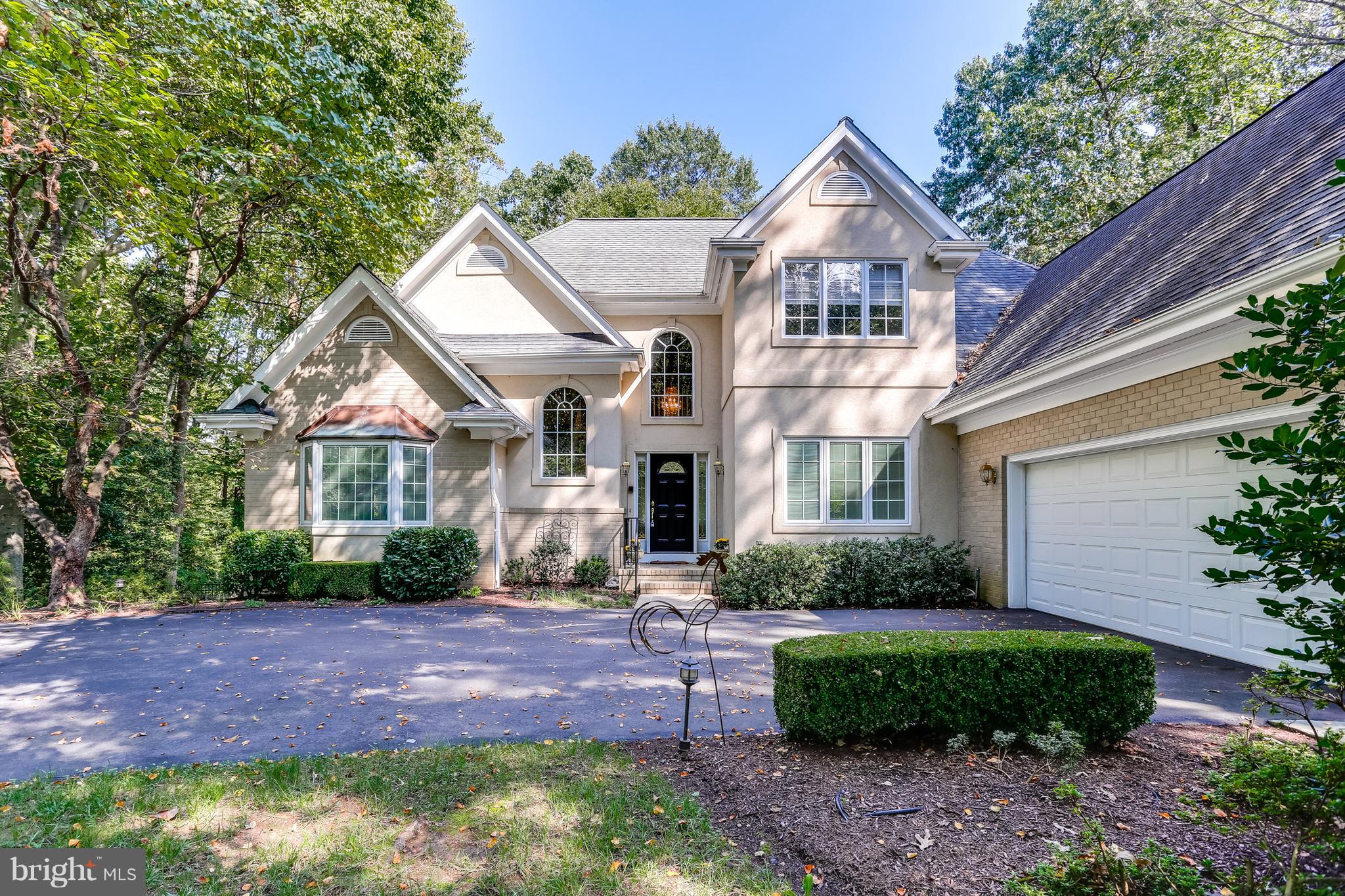 Beautiful Custom Built Home in coveted water privileged Belvoir Farms with Master BR on main level.  Loads of privacy located at the end of the street on a cul-de-sac and walking distance to path leading to the water privileges. Enjoy your fenced yard and deck plus a large covered gazebo. Family room boasts cathedral ceilings, built-ins + wet bar. Mud room features large doggie bath area!