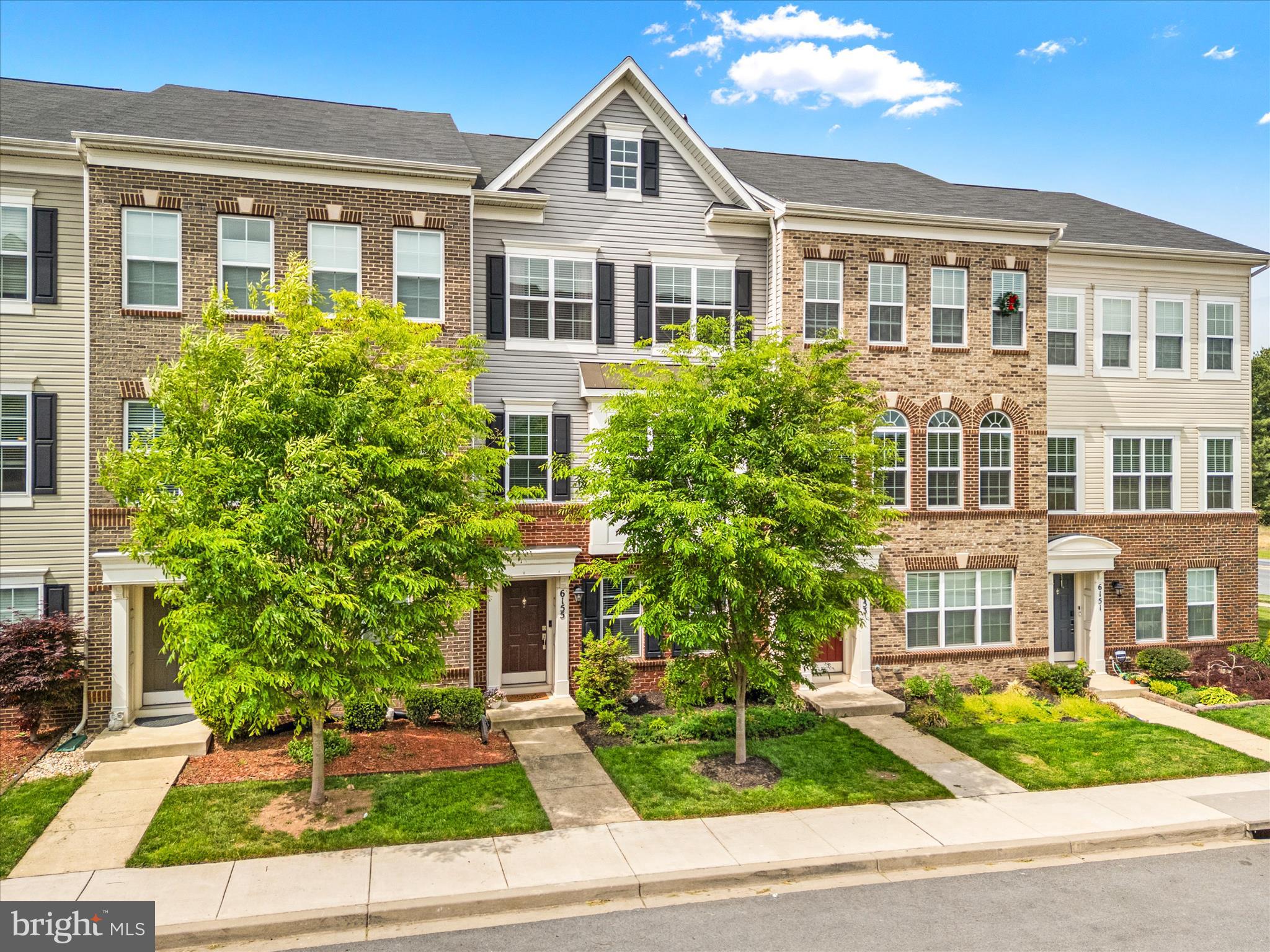 The best homes aren’t just beautiful—they make everyday living feel effortless. Welcome to 6155 Posey Street in the sought-after community of Jefferson Place, where modern design, mountain views, and everyday convenience come together just minutes from downtown Frederick and MARC train access—all with the added benefit of no city taxes.

Built in 2018 by Lennar Homes, this beautifully maintained 3-bedroom, 2 full and 2 half-bath home offers thoughtfully designed living space, complete with gas heating and gas cooking for everyday efficiency. The open-concept main level is filled with natural light and designed for real life—whether you’re hosting friends around the oversized kitchen island, enjoying quiet dinners at home, or simply unwinding after a long day.

Upstairs, the spacious owner’s suite feels like a true retreat, featuring a private bath with double vanity and walk-in shower, while two additional bedrooms provide the flexibility everyone needs—guests, a home office, or hobbies.

The finished lower level adds even more versatility with a spacious rec room, half bath, and closet—perfect for movie nights, a workout space, playroom, home office, or additional lounge area.

Step outside to the rear deck and take in the mountain views—your own peaceful backdrop for morning coffee or sunset evenings. A two-car garage adds convenience and storage, while Jefferson Place amenities, including a community pool, clubhouse, fitness center, walking trails, playgrounds, and open green space, offer the perfect blend of recreation, connection, and low-maintenance living.