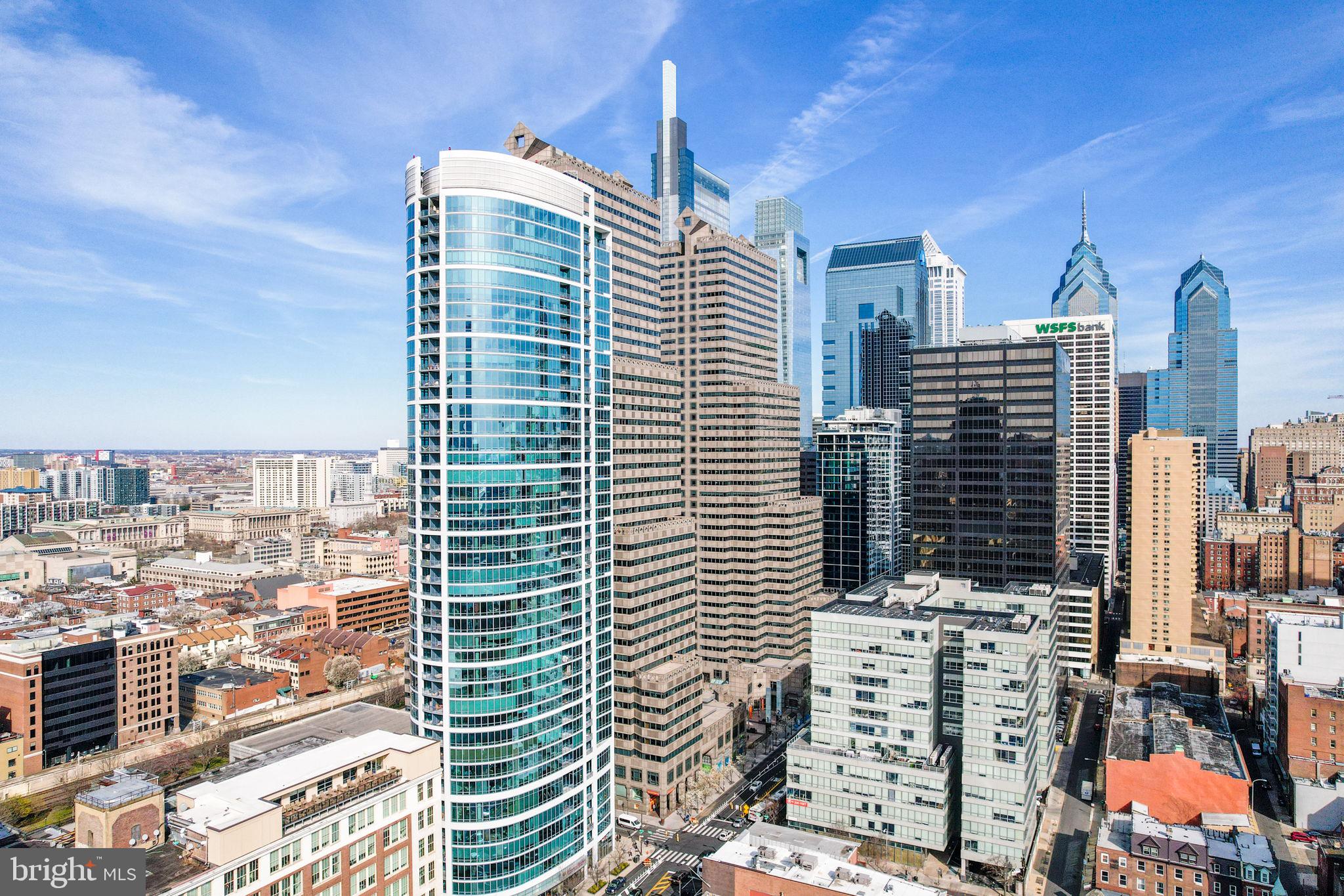 A spacious and luxurious condominium with AMAZING ENDLESS South & West facing views. This 2-bedroom 2-bath residence features modern and luxurious finishes including granite countertops, wood floors, stainless steel appliances, 9 -foot ceilings with floor to ceiling windows. The price includes a reserved parking space in the attached covered garage, and a storage locker. The building features a 24HR Concierge, fitness center, a heated 60FT lap pool, renovated sundeck/community room and much, much more! The building is situated conveniently next door to Trader Joes and Wine & Spirits - and is just walking distance from Philadelphia's top-rated restaurants. Spend the day shopping in Rittenhouse, or enjoying the sights at Boathouse Row, you can't beat the location and attractions located right near the Murano!