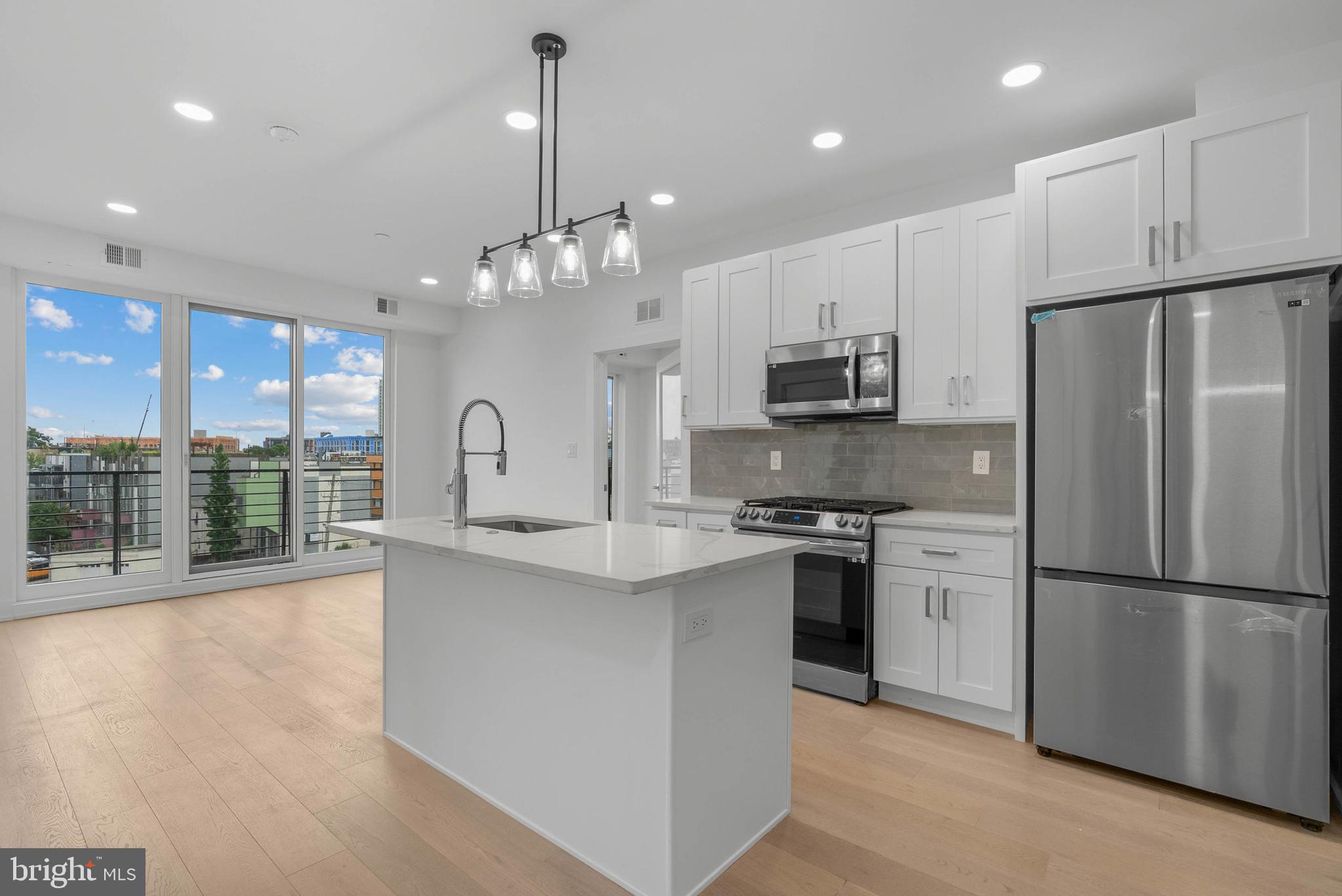 Introducing Artisans Edge – a stunning luxury condo development located on one of the most desirable blocks in Northern Liberties, one of Philadelphia’s most dynamic and sought-after neighborhoods. Most importantly this home has the ORIGINAL FULL 10 Year Tax Abatement, not the new graduated version.
 Known for its artistic roots, eclectic charm, and thriving food scene, Northern Liberties offers an unmatched blend of culture, creativity, and convenience. Artisans Edge features 13 thoughtfully designed residential units, each offering a modern and luxurious living experience with sleek, high-end finishes throughout. Choose from a variety of floor plans, all featuring spacious 2 bedroom, 2 bathroom layouts with open concept living, curated luxury finishes, a huge shared roof deck and top-of-the-line appliance packages. The penthouse units have a separate private entrance to the huge roof deck! Live just steps from vibrant 2nd Street, where you’ll find some of Philadelphia’s best dining, nightlife, and boutique shopping. You're also minutes from neighboring Fishtown, giving you even more options for weekend brunches, craft cocktails, and live music. There is a tax abatement (old abatement!). Taxes are not $1. Taxes & square footage are the buyer's responsibility to verify independently. Even though this is a new condo building, the Sellers preferred lender has 30 year fixed 5%-10% down mortgage products for this building. Please inquire with the listing team. The PAR Standard Agreement of Sale for New Construction of sale must be used for new construction properties whether completed or not. Parking is at a nearby lot (943 N 2nd St) for $325/month - while they last!  *Photos are of a similar unit.
Parking credit for one year must be noted on the agreement of sale if the buyer desires parking to be included with an acceptable offer.