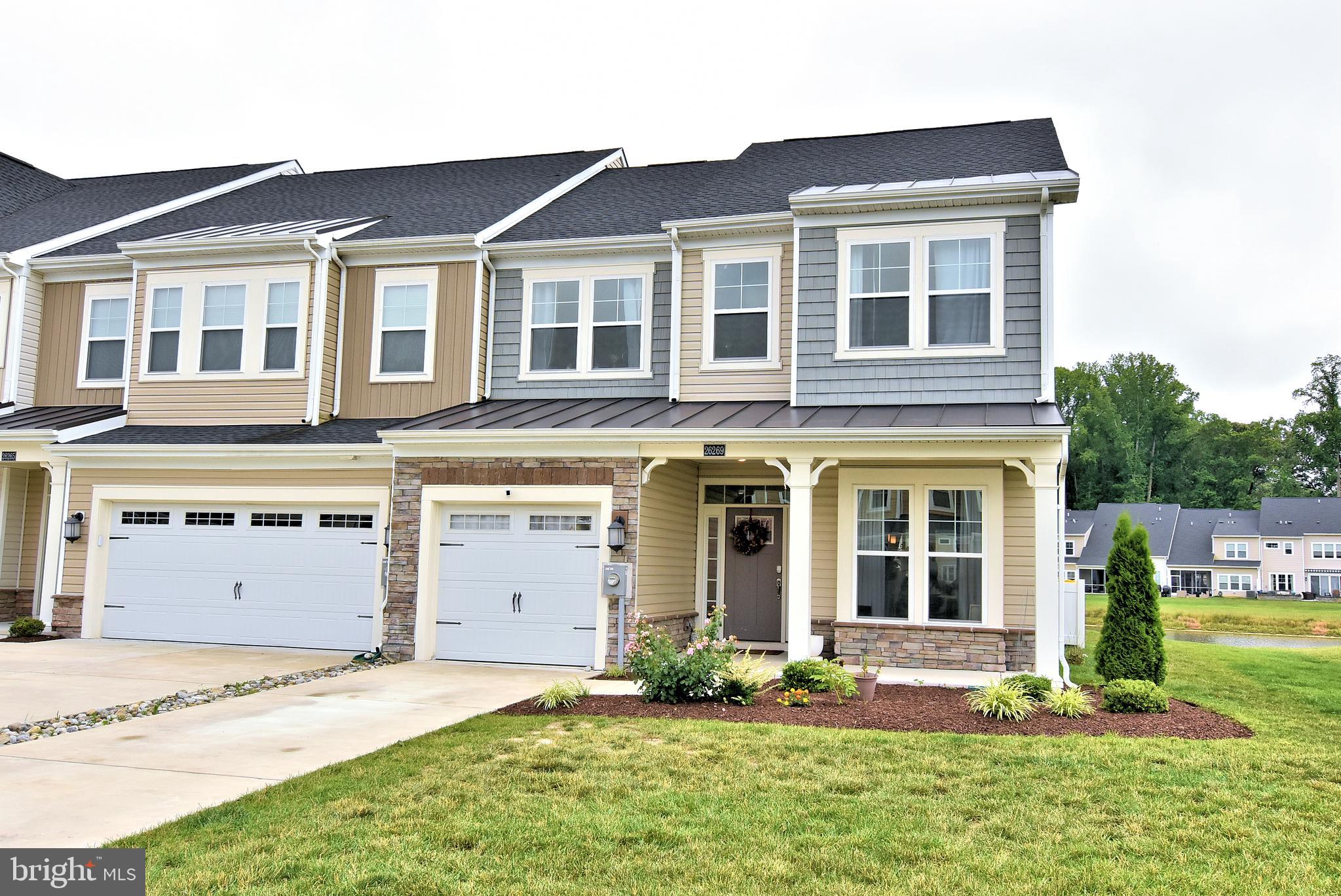 Don't miss out on this well maintained townhouse built in 2020 featuring 4 bedrooms 3 1/2 baths and a one car garage that could be used in many different ways. This well appointed townhome is an end unit allowing for more natural light, privacy and expansive pond views. Enjoy the ease of first floor living with primary suite, laundry room, powder room, open concept kitchen and living room, as well as dining room all on one level. On the 2nd floor you'll find 3 additional spacious bedrooms and 2 bathrooms with lovely quartz counter tops throughout the home. Plenty of parking in the driveway and overflow parking lot just across the street from the townhome. Enjoy the community pool and living maintenance free with the HOA taking care of trash, exterior of unit, lawn care & irrigation.
