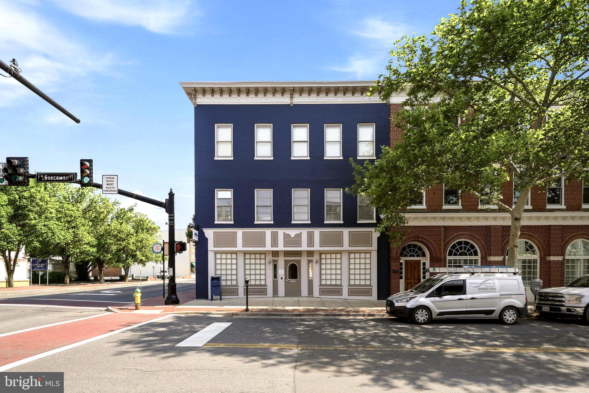 Beautifully restored and fully modernized mixed-use building in the heart of historic Winchester. This exceptional offering includes a fully leased commercial building with three strong-credit tenants, a valuable adjacent parking lot approved for future mixed-use development, and a third floor ready for residential conversion.

Located just one block from the historic Old Town Winchester Walking Mall, this legacy investment property offers more than 9,300 square feet of space with the first and second floors completely renovated and occupied. The third floor presents an outstanding value-add opportunity for apartment development, with potential eligibility for Historic Tax Credits. The property is also located within an Enterprise Zone, providing access to additional grant and incentive programs.

The sale includes the adjacent parking lot (Tax ID 173-01-E-1), which is approved for multifamily development or can continue to serve as a highly desirable dedicated parking facility for tenants and customers.

Current net operating income exceeds $80,000 annually, providing immediate cash flow with significant upside potential. Recent capital improvements include a metal roof, new HVAC systems, and modern tenant build-outs throughout the building.

This unique asset offers a diversified income stream with retail and office tenants in place, while creating future opportunities for residential development on both the third floor and the adjacent parking lot. Ideal for a 1031 exchange buyer or investor seeking stable income, long-term appreciation, and redevelopment potential in one of the Shenandoah Valley's most desirable downtown locations.

Conveniently located one block from the Braddock Street Parking Garage.

Rarely does an opportunity of this caliber become available in Downtown Winchester. Contact the listing agent to schedule a private showing.