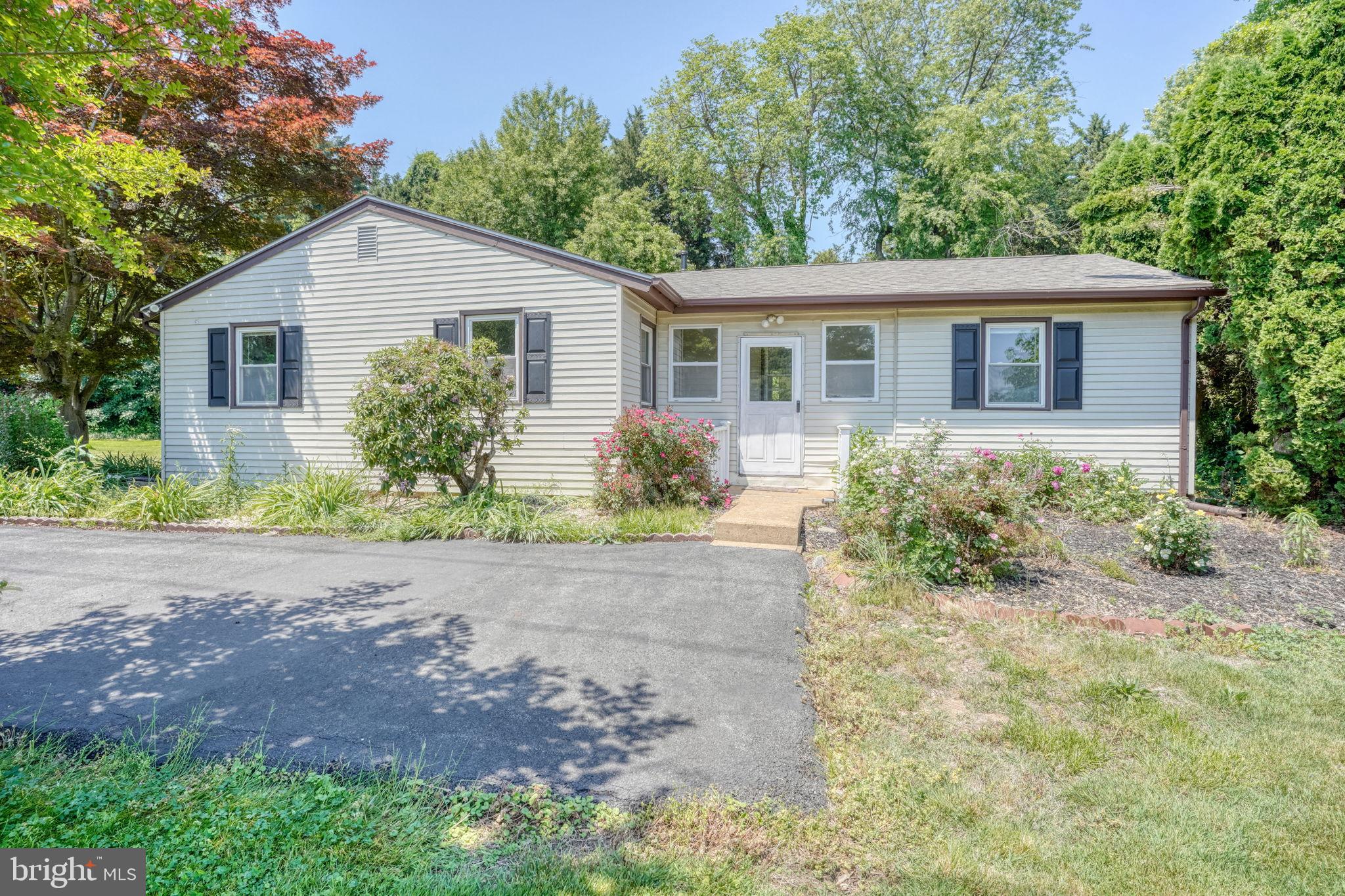 Welcome to easy living, this charming 4-bedroom, 1-bath ranch sits on a spacious 0.81-acre lot in the highly sought-after Appoquinimink School District. Conveniently located with easy access to Routes 1, 13, and 896, and just a few miles from grocery stores and everyday essentials.  The home features numerous recent upgrades, including a new roof, updated windows, and laminate flooring in the kitchen and laundry room. Original hardwood floors run throughout the rest of the home, adding warmth and character.  The adjacent lot is part of the .81 acre.  Use your imagination and design a yard that work for you.....garden, storage, an oasis, park your work vehicle, etc.  While the property is located along a main road, you can not hear the noise inside after a long day at work.  It offers an expansive yard with plenty of usable space. With no HOA fees, this property provides flexibility and freedom—ideal for a starter home or for those needing extra room for equipment or storage. There is also potential to build a pole barn on the side yard and possibly installing a privacy fence (buyer to perform due diligence).  An inviting home with plenty of potential—don’t miss this opportunity!  House is being sold "As-Is".