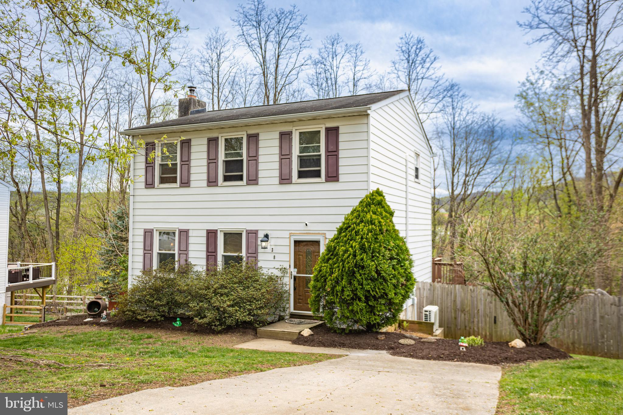 Great Opportunity to own an affordable Single home in Boyertown. This classic 3 bedroom and 1.5 bath two-story is characterized by small-town charm and curb appeal! Features include separate living and dining rooms with slider doors to your partially covered wooden deck with a ceiling fan,  kitchen with tiled backsplash and island, and powder room on the first floor. Upstairs are your 3 bedrooms and a full hall bathroom. The lower level has a laundry room, workshop area, and partially finished basement offering extra living space that can be used for entertaining, office space, a game room, a gym, and so much more. The walkout basement takes you to your covered concrete patio with a hot tub. Enjoy the perfectly sized yard for gatherings and cookouts. Park in your private driveway or on the street. This home is well-kept! Needs a little TLC to make it your own. While this hidden gem in Brookview is an amazing buy, the Property is being Sold Strictly AS IS and NO REPAIRS will be made. Close to Routes 73, 100, and 562. Schedule your showing today!