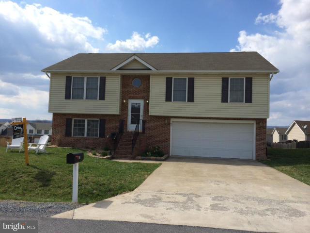 Well maintained home with cathedral ceilings. New carpet throughout and all appliances included. Basement is all finished except the garage area. It has two nice sized rooms that can be used for a family room, office. bedroom or just storage. Deck in back is ready for those summer barbecues! This home is perfect for the first time home buyer or anyone who is looking for a great home. Call today!