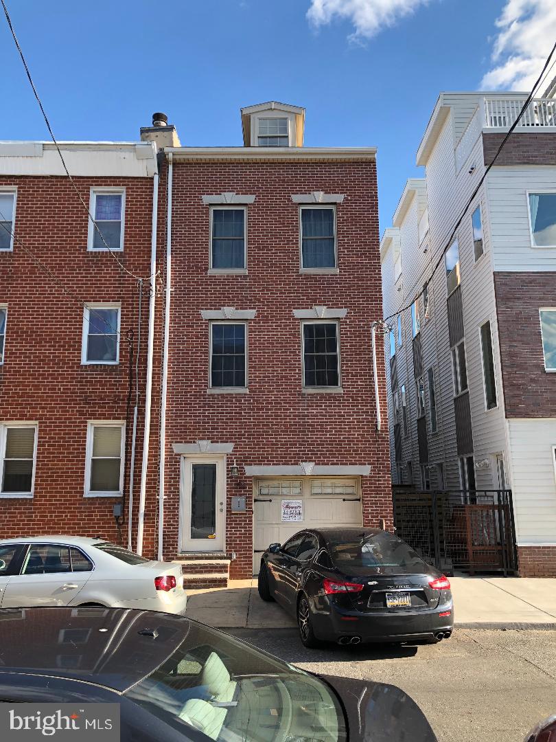 Welcome Home!! This luxurious 4bedroom & 2.5baths is located in one of the city's most desirable areas', FISHTOWN!! This spacious 2,400 square foot home is everything you could want and more!! The home features new upgrades and lots of character throughout. Featuring hardwood flooring throughout with an abundance of natural daylight. Step into your extra spacious living room that leads you into the kitchen and backyard. First floor includes a half bath which is a huge plus!! Recessed lighting & dimmers throughout. This magnificent kitchen has sleek granite countertops along with a custom designed "tin" ceiling, which is very unique!! Ceramic tile flooring, 42inch cabinets, and stainless steel appliances with industrial sized refrigerator. Walk out to a large private fenced in yard, designed for gatherings, barbecues and pets. Second Floor has 2 enormous bedrooms along with a full Jack & Jill bathroom that features his and her sinks, stall shower, and jacuzzi tub which is perfect for relaxation. Walk out to your fiber glass deck off the 2nd floor as well as on the roof top with sweeping views. Tons of closet space with a walk in closet in 2nd floor & 3rd floor bedrooms. The third floor has 2 over- sized bedrooms with plenty of windows with stall shower and yet another jacuzzi. Laundry area on 2nd floor for your convenience. The home also offers OFF STREET PARKING with attached garage. Never have to worry about finding your parking spot with your very own garage and driveway parking!! Newer 2 Dual Zoned HVAC, Newer electrical along with Newer windows. TAX ABATEMENT STILL REMAINING!!  This home is truly a move in ready home and quality of workmanship speaks for itself with this beauty. Come take a look for yourself as you won't leave disappointed. Priced to sell and won't last long at this price. Show & Sell. All offers will be presented!!