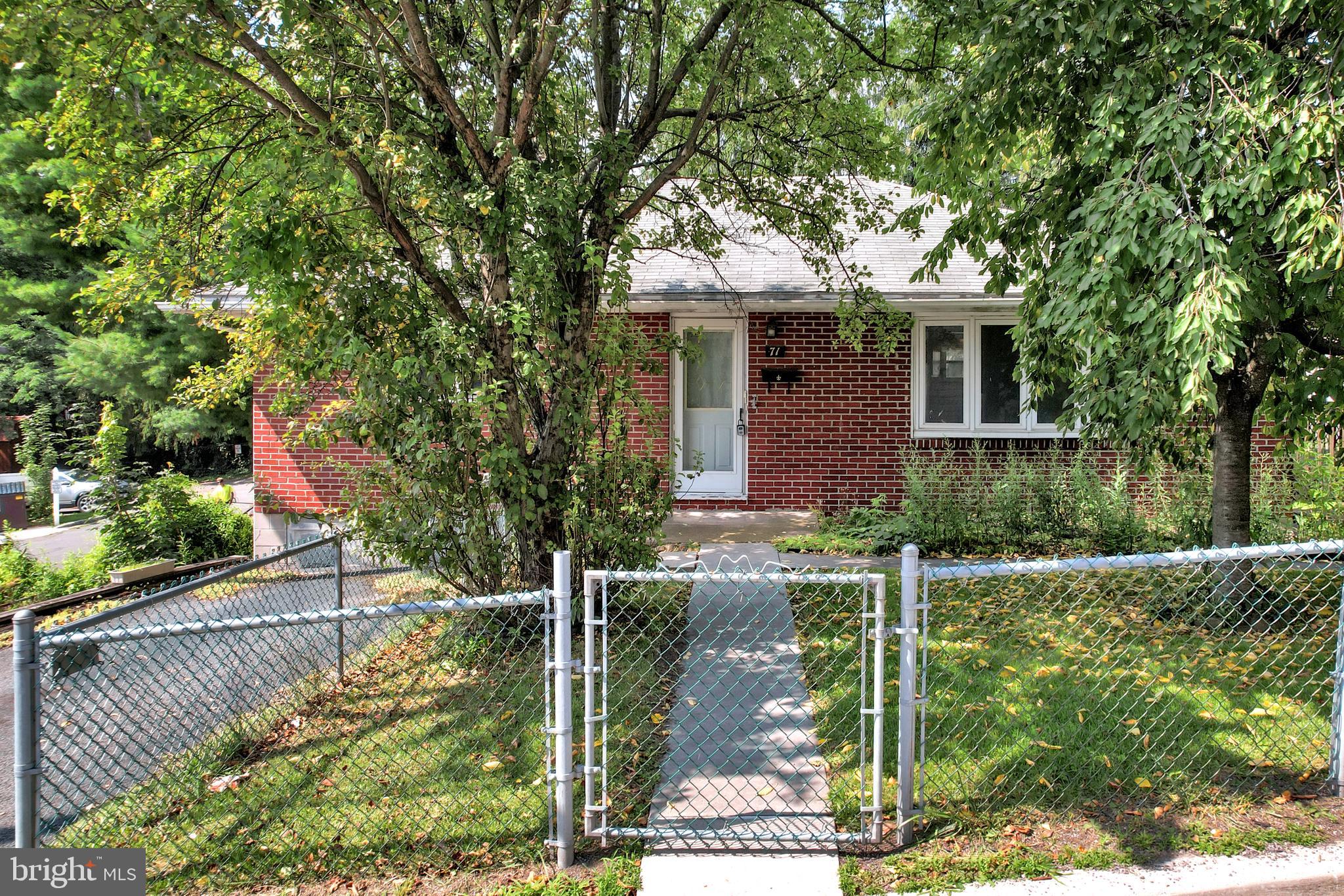The Space You Need, the Convenience You Want, and the Frostburg Lifestyle You’ll Love!  Welcome home to this spacious four-bedroom, two-and-a-half-bath brick rancher offering the ease and comfort of true one-level living. With generous living space, a fenced yard, and a convenient location, this home is designed for everyday comfort and memorable family moments.  The large eat-in kitchen offers plenty of room for cooking, dining, and gathering with loved ones. All appliances convey, helping make your move simple and stress-free. A hot-water baseboard heating system provides steady, comfortable warmth throughout the colder months.  Step outside and unwind on the covered side deck, a perfect place for morning coffee, outdoor meals, or relaxing after a busy day. The fenced-in yard provides added privacy and a secure space for children or pets to enjoy. A private driveway offers convenient off-street parking.  Located near downtown Frostburg, this home is close to shopping, local restaurants, parks, community events, and Frostburg State University. Enjoy the charm of small-town living, beautiful mountain scenery, nearby walking and biking trails, and easy access to Interstate 68. Deep Creek Lake and many of Western Maryland’s recreational attractions are also within a comfortable drive.  This inviting rancher offers the space, location, and one-level convenience today’s buyers are looking for. Call today to schedule your private tour and discover why this Frostburg home could be the perfect fit!  Priced to sell!