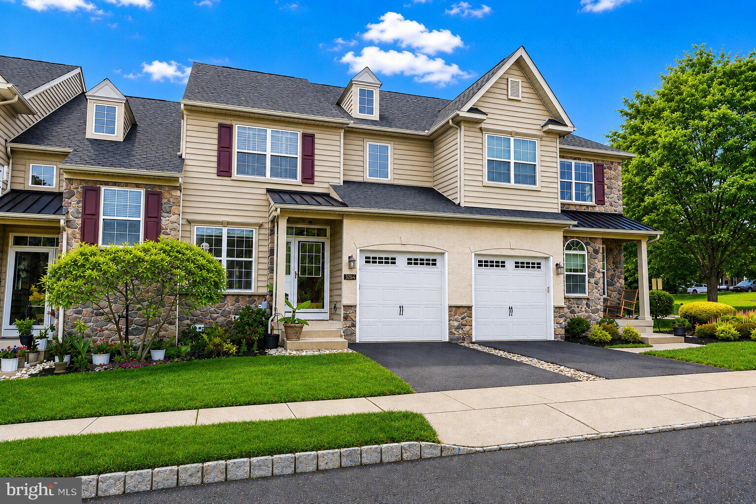 This is the home you have been waiting for in the highly acclaimed Central Bucks School District - One of the largest models in Heritage Center! Welcome to this beautifully-maintained former model townhome in one of Central Bucks' most sought-after communities. Perfectly positioned with easy access to the community clubhouse, fitness center, pool, and tennis courts, this elegantly appointed townhome offers the ideal combination of luxury, convenience, and low-maintenance living. With over 2,700 square feet of thoughtfully designed living space including a finished lower level, rich hardwood floors, stylish crown molding and wall accents, abundant natural light, and an open-concept layout to create an inviting atmosphere from the moment you enter. At the heart of the home is a chef-inspired kitchen featuring an oversized granite island, premium mocha cabinetry, stainless steel appliances, and generous workspace for both everyday living and entertaining. The kitchen flows seamlessly into a bright breakfast area and spacious family room centered around a gas fireplace, creating the perfect gathering space for family and friends. Formal living and dining rooms provide additional flexibility for entertaining, holiday gatherings, or quiet evenings at home. Upstairs, the luxurious primary suite serves as a private retreat, showcasing a tray ceiling, plantation shutters, dual walk-in closets with custom shelving, and a spa-inspired bath complete with a soaking tub, glass-enclosed shower, and double vanity. Two additional bedrooms, featuring plantation shutters, ceiling fans, and ample closet space are near the beautifully appointed hall bath and convenient second-floor laundry, completing the upper level. The finished lower level expands the home's versatility and is ideal for a media room, home office, fitness studio, recreation space, or guest accommodations. A powder room and extensive storage add even more functionality. Outside, the composite deck offers the perfect setting for morning coffee, outdoor dining, or relaxing summer evenings. Located just minutes from the boutiques, restaurants, parks, and cultural attractions of historic Doylestown and New Hope, this exceptional home delivers the lifestyle today's buyers are searching for.