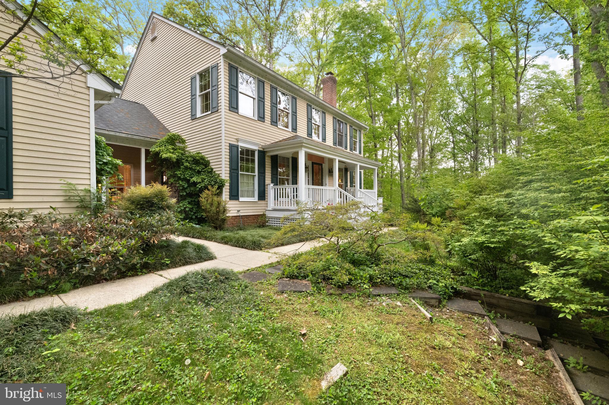 Pure Privacy on this wooded paradise here in Annapolis. Situated on a private, 1.42 acre lot, you're going to love the sun-filled family room and adjacent sunroom. The kitchen has been remodeled with gorgeous, wooded cabinetry, granite counters and high-end appliances.  There is a formal living and dining room for all of your functions. The basement has been waterproofed and is walk-out level and ready to be finished. There are three bedrooms upstairs with an open office/loft area.  Explore nature or just enjoy the hummingbirds from the back deck and porch. Close to everything, but feels miles away!