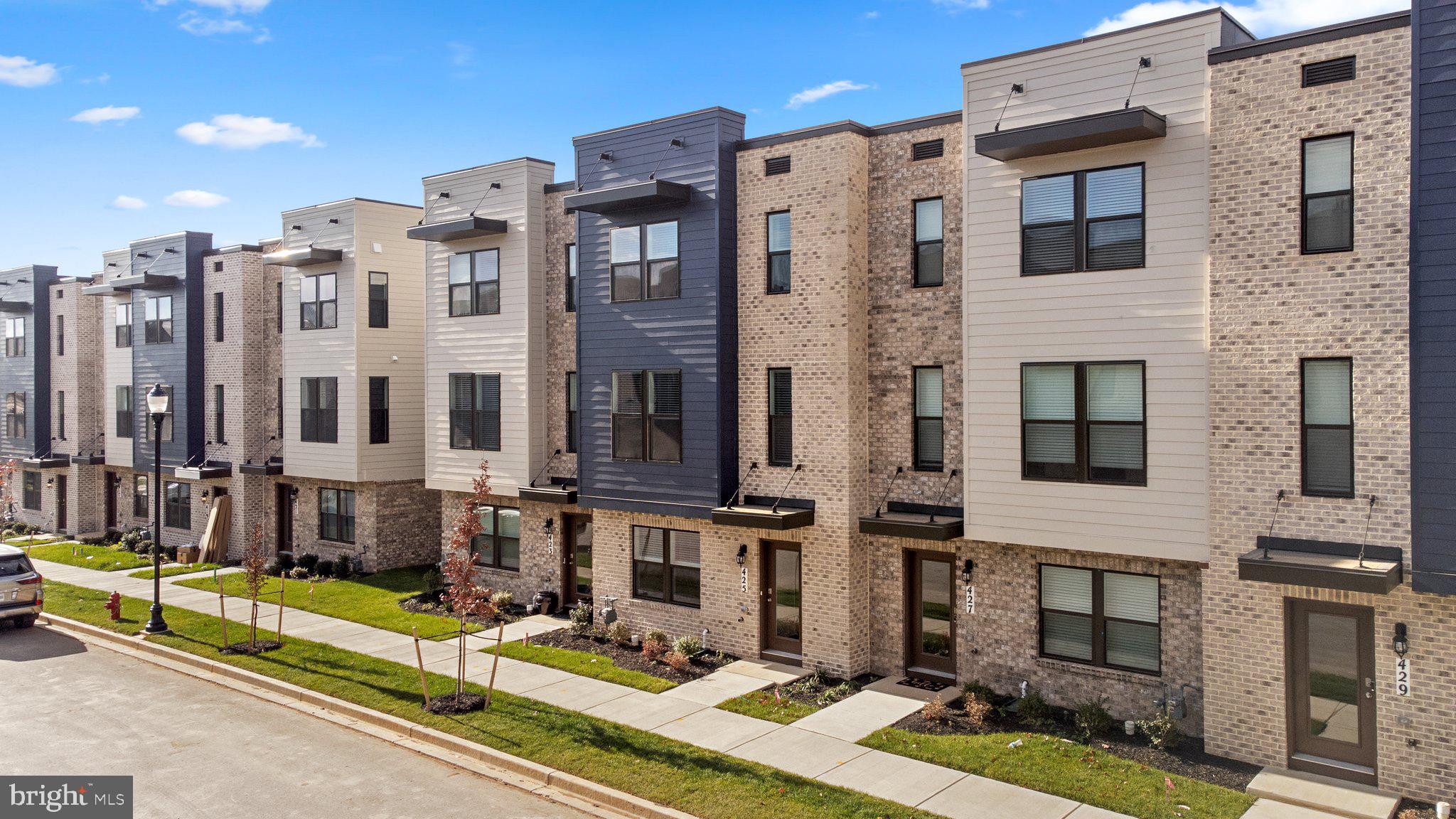 Don't miss this opportunity! This newly constructed (2023) four-bedroom townhouse is a masterpiece of modern design and convenience. The open-concept living space features a beautiful large kitchen with brand-new white cabinets, sleek stainless-steel appliances, elegant quartz countertops—perfect for entertaining.  A deck off the kitchen provides a delightful outdoor space for relaxation or al fresco dining. The upper level boasts three spacious bedrooms and two full bathrooms, while the lower level provides a private retreat with the fourth bedroom and its own full bathroom, ideal for guests, a home office, or a playroom. Forget parking woes with the two-car garage and additional driveway space for 3-4 cars. Enjoy community living with the clubhouse, pool (Coming Soon), and playground just steps away. This neighborhood also features an onsite retail section offering shopping and dining options (Coming Soon). Plus, a walking trail leads directly to downtown Frederick, adding the charm of small-town exploration to your doorstep. High-quality finishes, attention to detail, and a sought-after location make this townhouse a lifestyle upgrade. This neighborhood's prime location also provides easy access to I-70 and I-270, ensuring seamless connectivity for your daily commute or weekend adventures. Vouchers Welcome