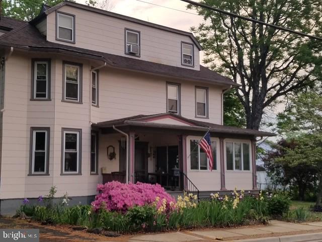**** Price Adjustment****Charming Victorian Beauty!  5 BRs and 4 BAs-Step into the timeless charm of this beautiful Victorian home built in 1899, perfectly situated just moments from shops, restaurants, Metro green and upcoming purple lines, commuter rail, parks, a farmers market and more. From the front porch enjoy a postcard‑worthy view of the historic Riversdale Mansion, setting the tone for the peaceful, tranquil lifestyle this property offers. Inside, this home provides remarkable flexibility with 5–6 bedrooms  (the home office has a closet and can serve as a bedroom), 4 full baths, 3 fireplaces and 3 full kitchens—ideal for multi‑generational living, rental potential, or simply spreading out in comfort.
The main and second levels showcase refurbished original hardwood floors and restored original trim, preserving the home’s 19th‑century character while blending seamlessly with modern updates. The entire second level was taken down to the studs and rebuilt with new electrical, plumbing, insulation, and ductwork (already installed) for a future 2‑zone AC system. A thermostat line is conveniently run to the second‑floor sitting room, off primary bedroom. Outdoor improvements elevate the property even further. A new carport, built from the ground up, is topped with a new balcony accessible from the second‑floor sitting room, off the primary bedroom. With amazing views, enjoy your morning coffee, and upon returning back into your sanctuary,  a gas fireplace to keep you warm and cozy New rear steps to the top floor 1 BR apt,  were added within the last 8 months. This top level unit can be accessed both inside and outside, offering privacy and versatility. The exterior also features new siding on the sunporch and carport. This home also includes central air on the main and lower levels for year‑round comfort. But wait, there’s more! Step outside to your own private oasis: a heated in‑ground pool, accompanied by a charming pool house with a tin roof, bar area, changing room, a real “staycation”! Theres a separate equipment room for the heater and pool pump(with propane tanks for heating),. Off‑street covered parking for 2-4 cars adds everyday convenience. A nice yard as well, for gardening or play. With its blend of historic elegance, extensive renovations, and rare amenities, this Victorian treasure offers a lifestyle that is both serene and exceptionally functional.