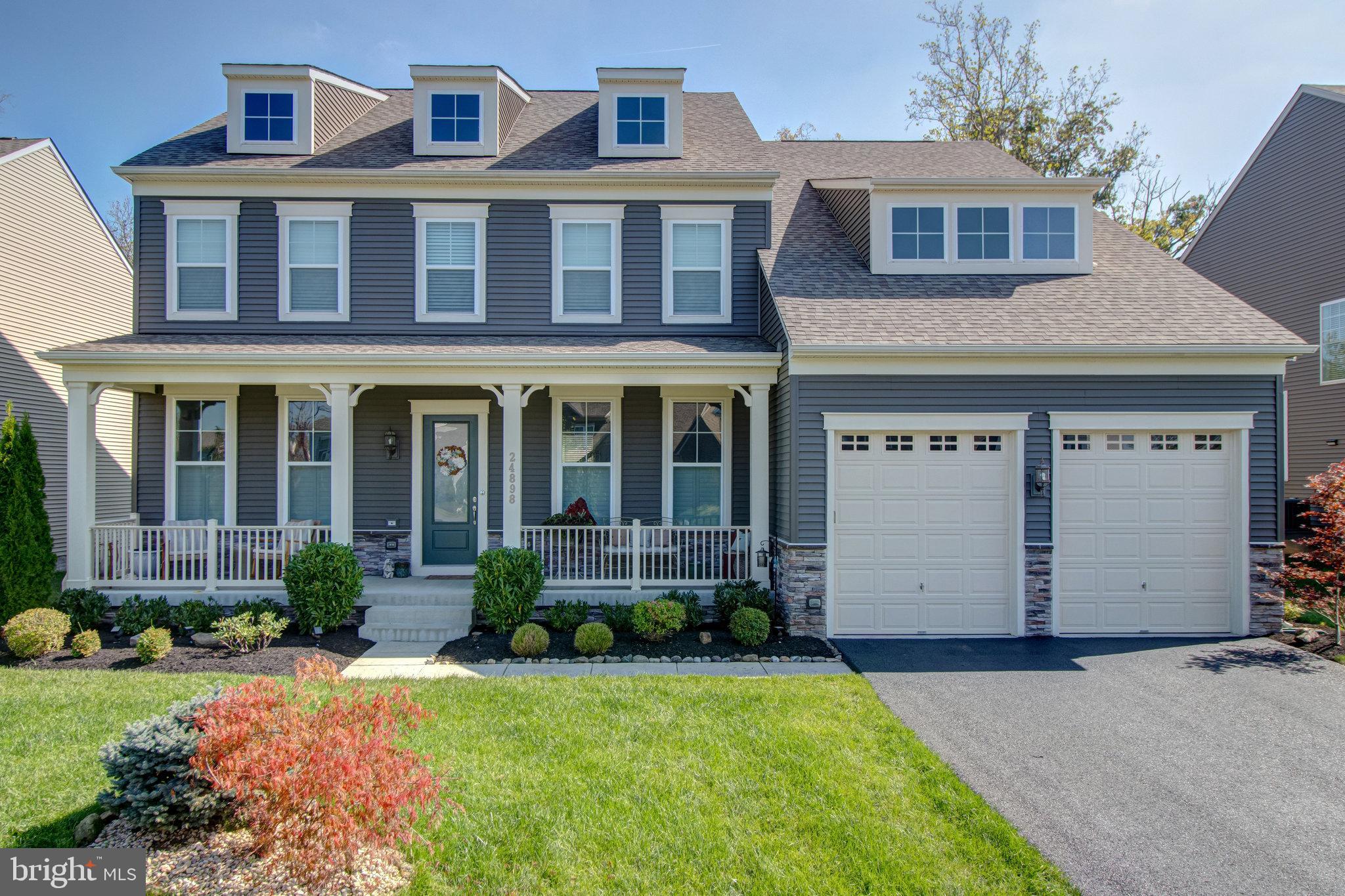 This Taylor Model home, built by Stanley Martin, offers the homebuyer many benefits with the added upgrades to enhance the overall quality.  To start please notice the upgraded flooring, ceilings, and kitchen.   The main level in this amenity-filled home has all the features you'd expect in a contemporary design, such as a gourmet kitchen with a sit-down island, a walk-in pantry, a large great room off of the kitchen, and the selected option of a sunroom; all add exceptional space to live your best life.   It's easy to see yourself cooking a meal in the kitchen while your family hangs out nearby. The Taylor model also features a guest suite on the main level for additional living and sleeping accommodations. Additionally, this home has many modern-day amenities busy families will love including outdoor living options, work-from-home spaces, and open-concept living areas. With easy access to shopping and dining and highly rated neighborhood schools paired with a home on a large, private homesite, McIntosh is the ideal neighborhood to own your dream home.  So, enhance your life with this lovely large, custom home on a private home site in a sought-after school district that is hard to find.    Stanley Martin's neighborhood gives homebuyers an exceptional opportunity to own a home in this sought-after area of Loudoun County.