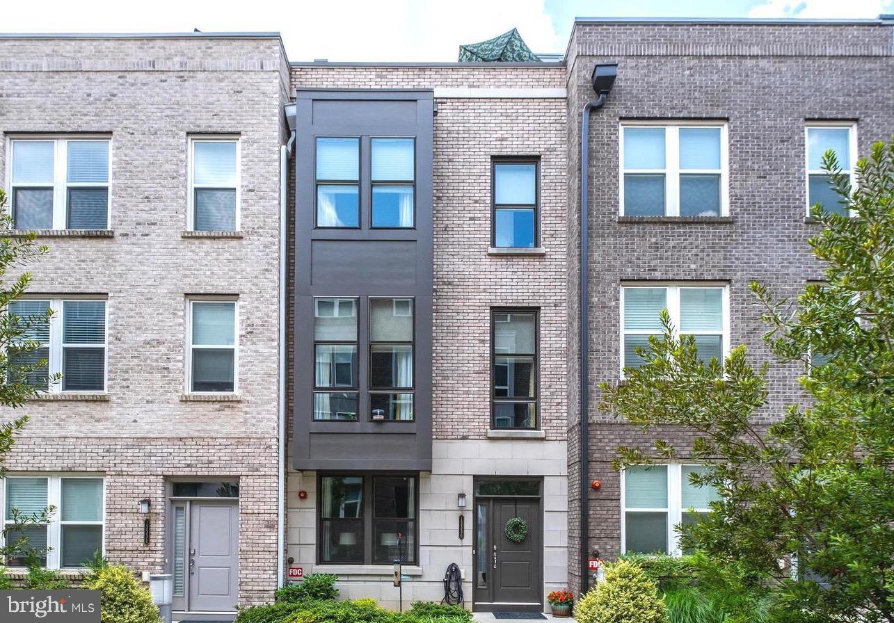 well maintained freshly  painted townhouse located in walking distance to the metro station and  the shopping center, Large island with seating and custom pantry. 
 custom made walk-in closets, pantry, laundry shelving, coat closet by "Closets by Design"
house has a gas heater & stove, oven can be controlled by App, also there are automated shades
Perforated Garage Floor Tile gives an opportunity to wash inside, garage doors are controlled by App .
it's one bus stop to the Airport and one bus stop and Museum , stunning roof deck with a gas grill and tree top views. 
Not to be missed.