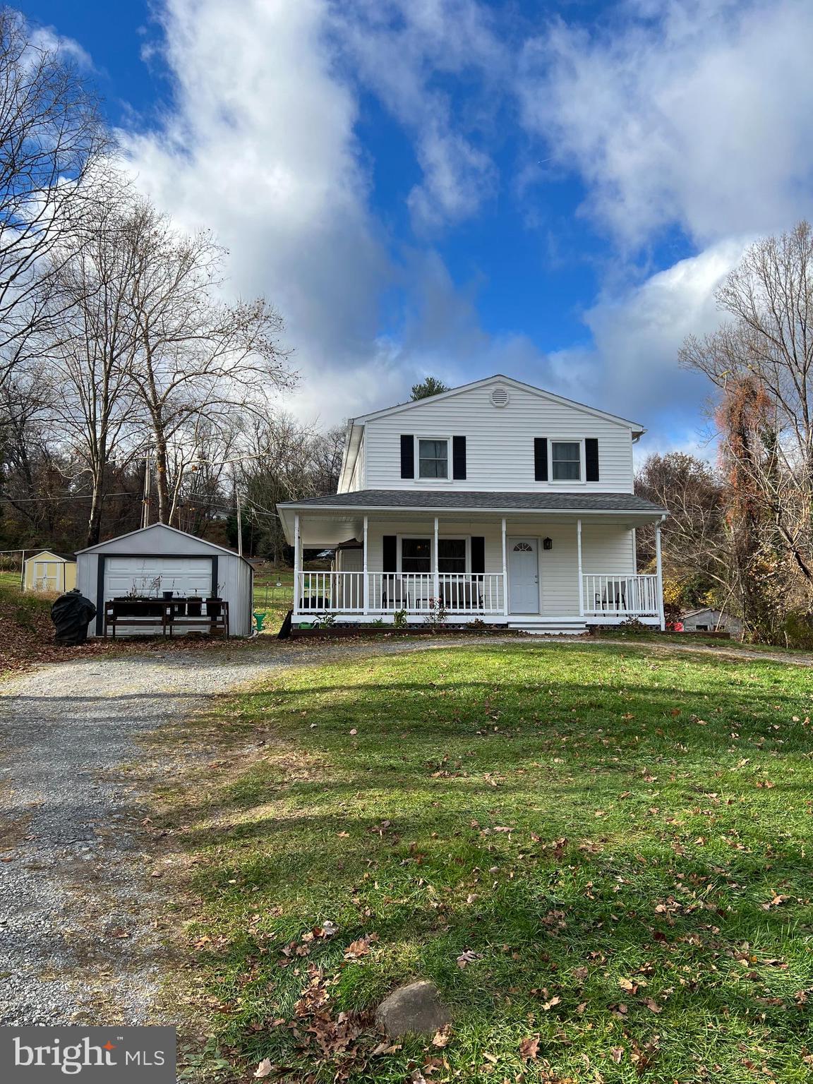Nicely updated spacious home near the Virginia line but only a few minutes from town. Approximately 2/3 acre and no HOA. Many recent updates including roof, replacement windows, kitchen, baths, flooring and more. New dual heat pumps and ductwork installed in 2023. The backyard hosts a fenced-in vegetable garden area complete with raised beds and arched trellises for vertical growing which is partnered with an additional fenced-in area for pets to roam freely. Located just a few minutes from The River and Mountain Lake Club which offers fishing, swimming, a beach area, kayaking and a bar and grill with live music.
