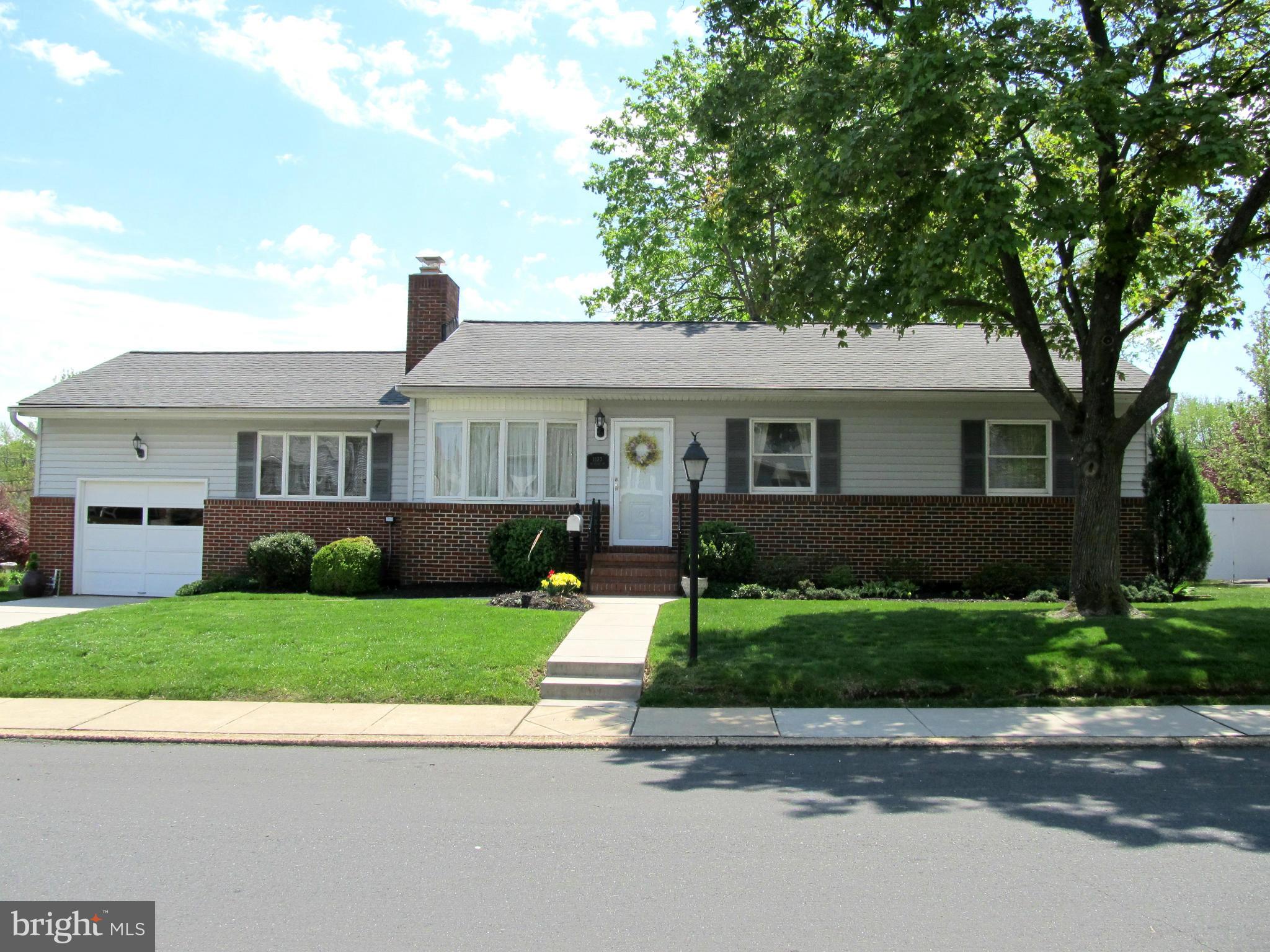 This lovely rancher is immaculate!!  Featuring updated kitchen with quartz counter tops and tile backsplash, updated bath, spacious living room with fireplace and separate den, finished basement with full bath, gorgeous patio enclosure overlooking landscaped yard and in-ground pool, garage..this house has it all!  Absolutely move-in ready!  Convenient to most major routes..Hurry; come see!!