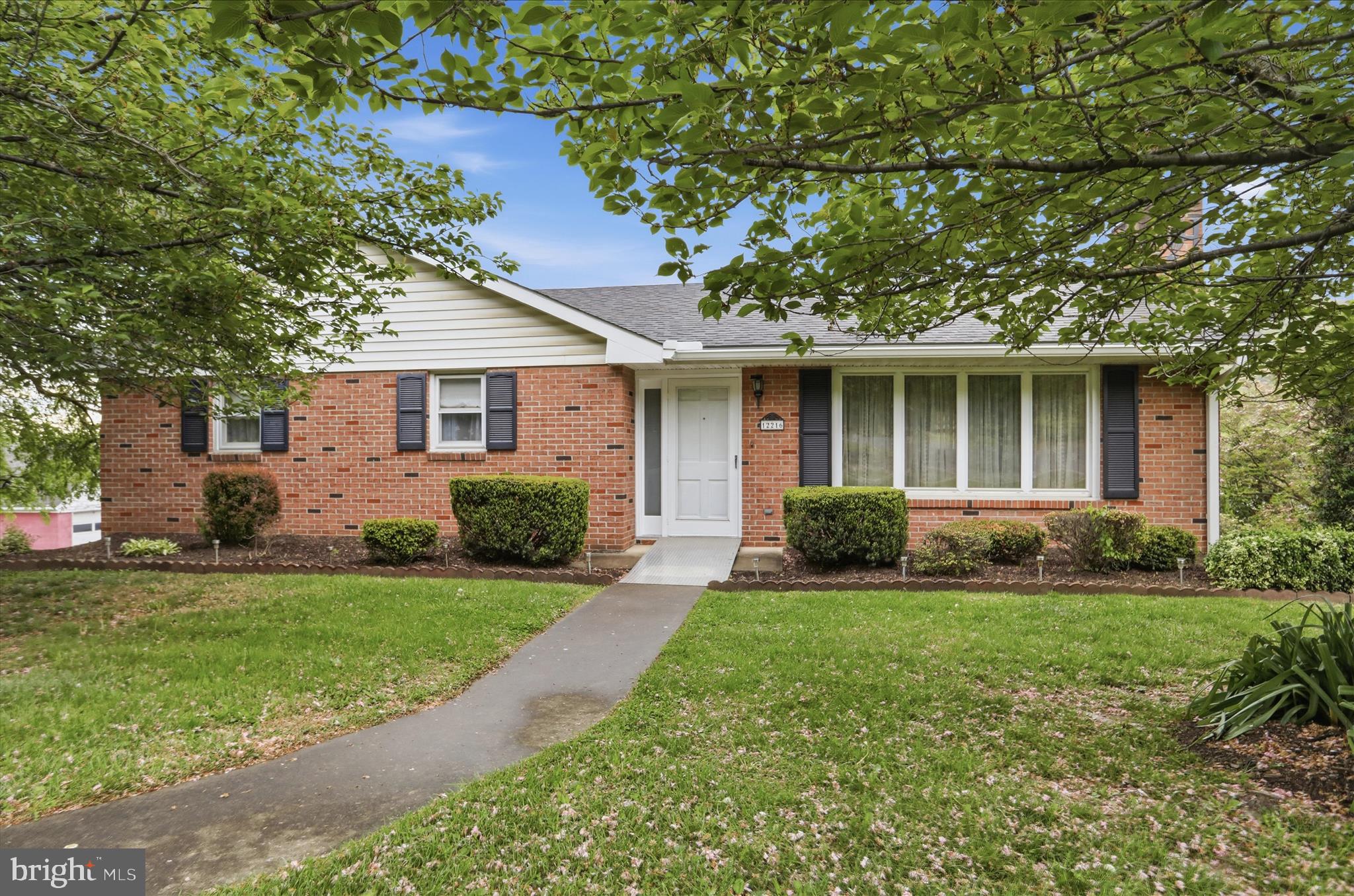 This solid brick rancher in the heart of Cresaptown is the perfect blend of comfort and versatility. The main level has a masterfully remodeled roll-in shower for effortless accessibility. Relax by the wood-burning fireplace in the living room or head downstairs to a massive lower-level family room featuring brand-new flooring and a cozy gas fireplace. With a dedicated den that easily doubles as a 4th bedroom, a full second bath, and an oversized 1-car built-in garage, this home is designed to grow with you. Sitting on a fantastic yard, it’s a rare find that combines classic "bones" with some modern upgrades!