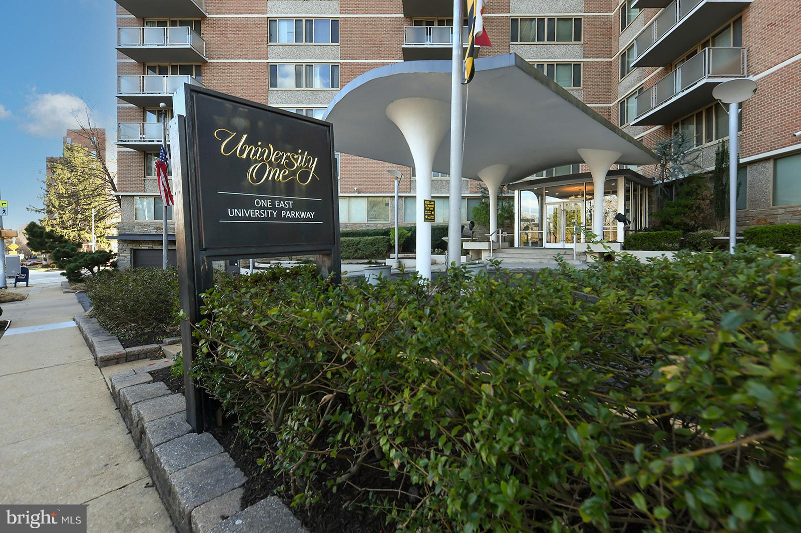 Welcome to 1 E University Pkwy Unit 908 a spacious 1-bedroom, 1-bathroom condo with incredible views overlooking Johns Hopkins University Campus, perfectly located next to the Johns Hopkins University campus in the heart of Charles Village/Guilford. This unit offers a rare opportunity to invest in a well-sized unit brimming with potential. It’s the perfect blank canvas for either a savvy investor or an owner-occupant looking to add personal touches and build real value. . The kitchen is fully functional and ready for your vision, while the primary bedrooms offers generous space. New carpet recently installed throughout the unit.

The secure building features concierge services, key fob entry, and an array of amenities including a rooftop pool, a spacious lounge/rec area with a full kitchen for hosting, a fitness center, and a Smart Laundry Card System. Garage parking is available for lease at just $70/month. Located just steps from Johns Hopkins University, Union Memorial Hospital, and the greenery of Guilford Park, you’ll also enjoy easy access to the JHU shuttle, local restaurants, farmers’ markets, and shopping. While the property is being sold as-is, its location and layout make it a rare chance to customize a home in one of Baltimore’s most sought-after neighborhoods. Don’t miss the opportunity to unlock the full potential of this gem. Schedule your showing today , your next investment to add to your portfolio.