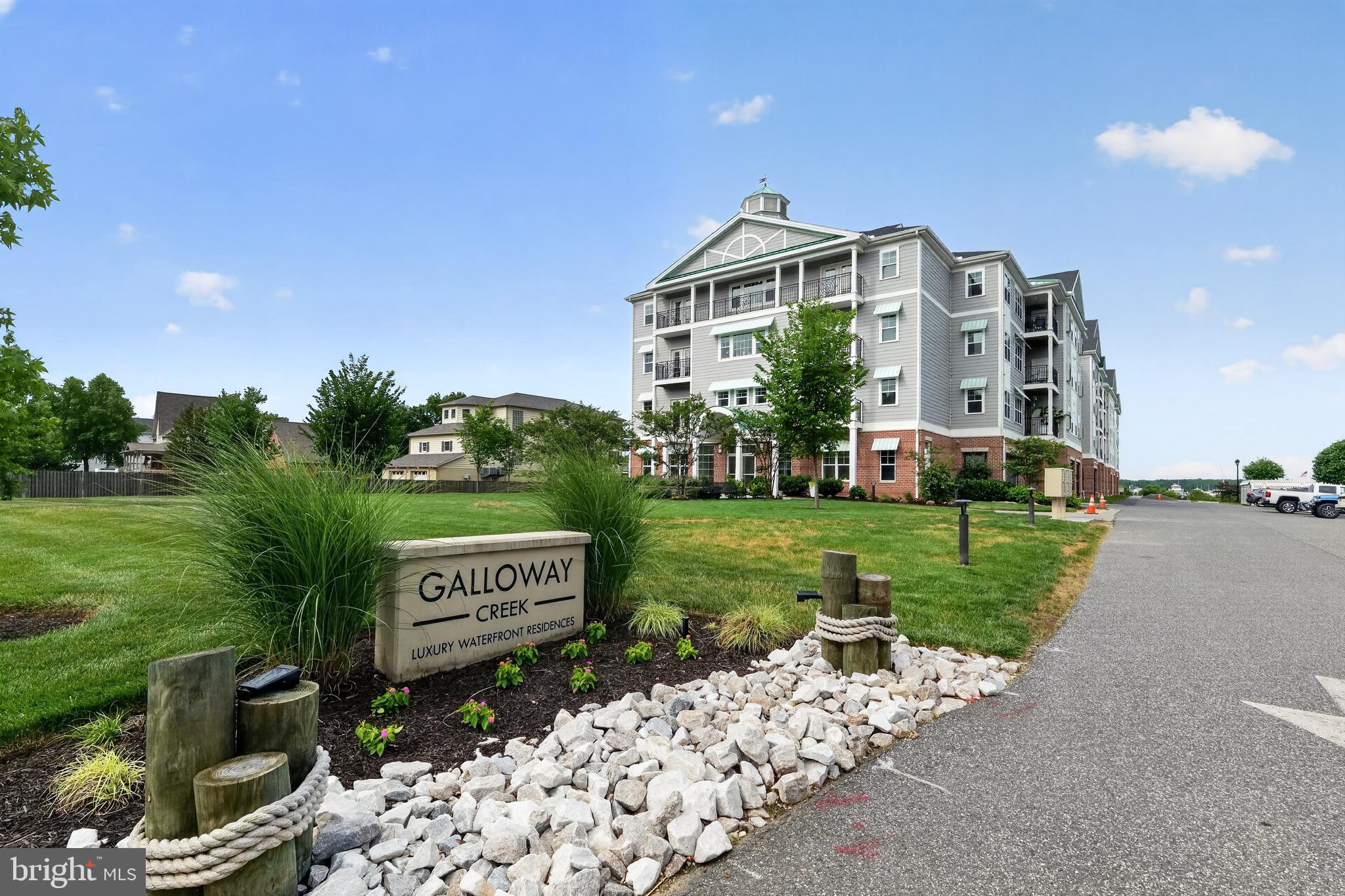 Welcome to Unit 109 in the highly sought-after Galloway Condominiums, where luxury, convenience, and waterfront living come together. This impeccably upgraded condo has been thoughtfully enhanced from top to bottom and is truly one of a kind. Included with the unit is an assigned covered parking space in the secure garage, along with a private, secure storage area offering additional space for all your gear and seasonal items. For boating enthusiasts, this property is second to none. The sale includes a 40-foot boat slip equipped with a 20,000-pound boat lift, making it ideal for accommodating a wide variety of vessels. The deep-water marina provides easy access and peace of mind for larger boats. Inside, you'll appreciate the countless upgrades, including a whole-unit water filtration system, custom shelving in the storage room, closets, and laundry room for exceptional organization. Relax on your private balcony featuring a ceiling fan and a screened door, creating the perfect space to enjoy the fresh waterfront breeze. The beautifully renovated bathrooms showcase elegant tile work, frameless glass shower doors, and high-end finishes that add a touch of spa-like luxury.  Every detail has been carefully considered, making this a truly move-in-ready home that would be difficult—if not impossible—to recreate at this price. Don't miss this rare opportunity to own one of the finest residences in Galloway Condominiums. Schedule your private showing today before this exceptional property is gone.