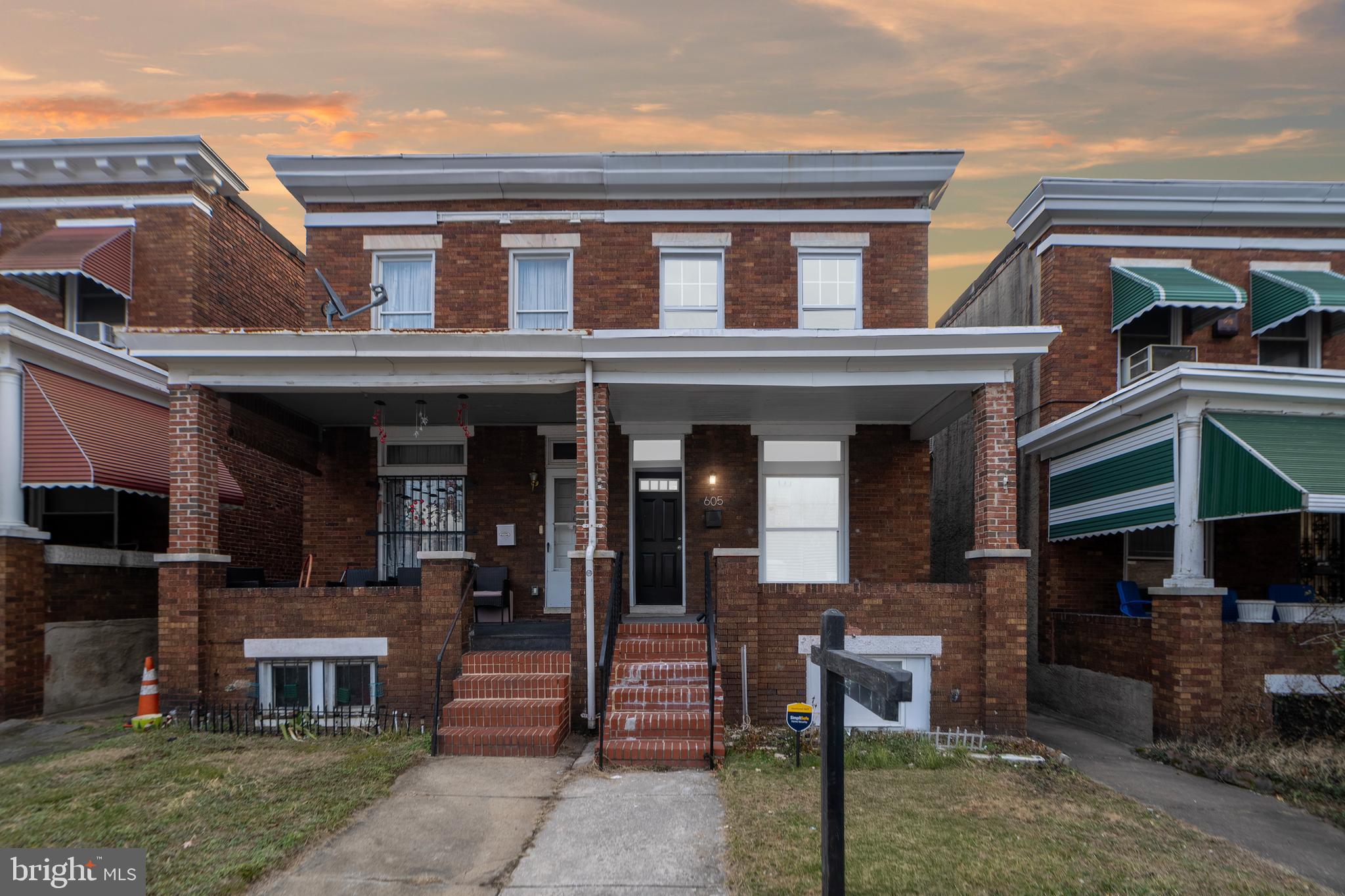 *MOTIVATED SELLER*  Welcome to 605 N Bentalou St! This beautifully updated townhome is nestled on a quiet street in the desirable Evergreen Lawn neighborhood. As you approach the home, a charming covered front porch welcomes you. Step inside to discover an impressive transformation, featuring an open-concept design. The spacious layout includes a stunning open staircase, a bright and airy living room, luxurious flooring, and a chef-worthy kitchen. The kitchen is a standout, offering ample cabinetry, stainless steel appliances, and sleek quartz countertops. Upstairs, the newly carpeted second floor is home to a spacious primary suite with a walk-in closet and a private ensuite bathroom. The finished lower level provides additional living space, a laundry area, bedroom, a full bath with a walk-in shower, and a convenient walk-out backyard with a parking pad out back. This move-in-ready home offers modern updates, abundant space, and a prime location just minutes from marc train station, downtown and Mondawmin mall! Come schedule your tour today!