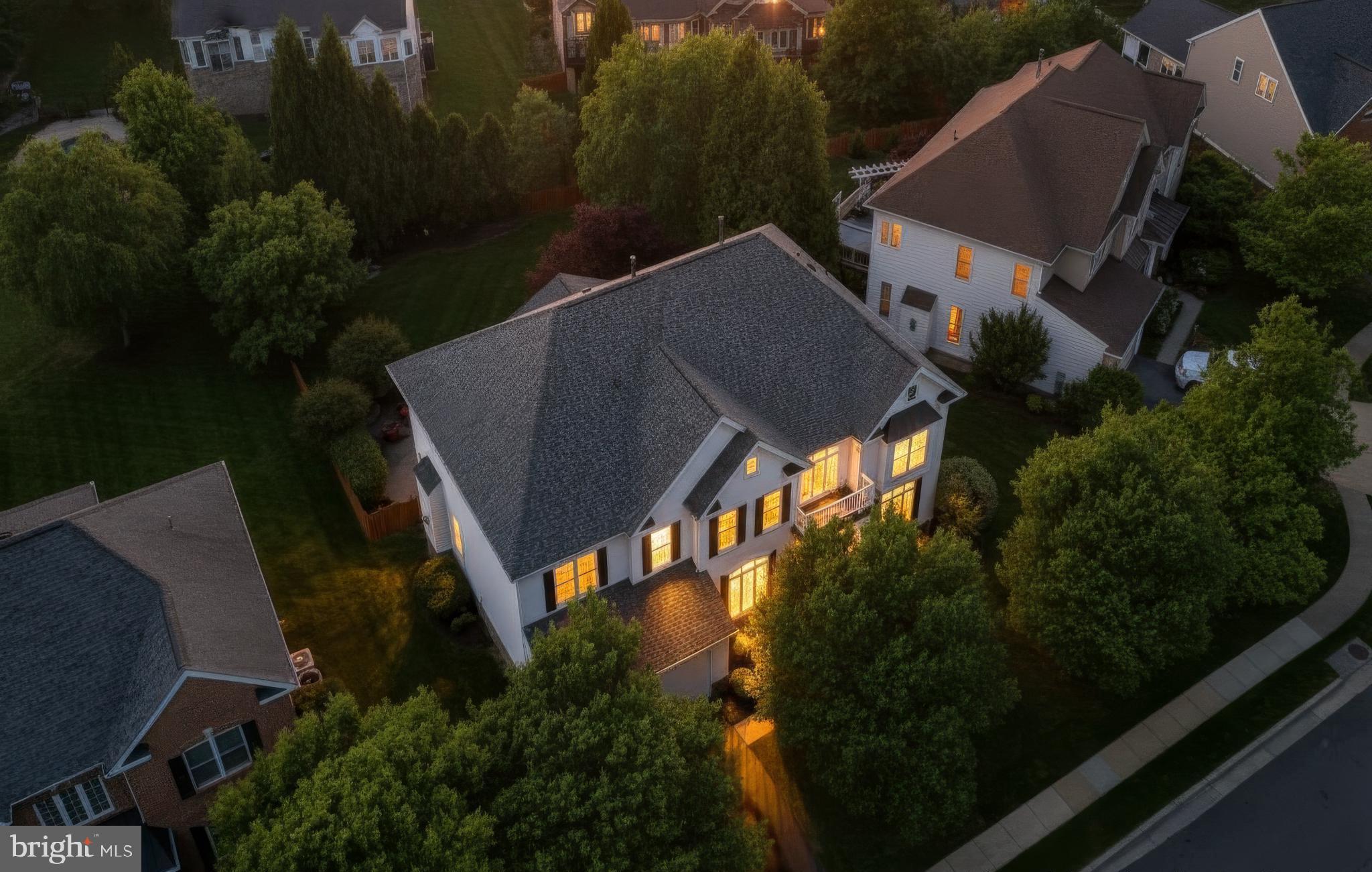 ** OFFER DEADLINE SET: Monday 6/8 @ 3pm **  What a Wonderful Open House- Thank you Everyone! **Boasting nearly 6,000sf, this residence lives large and effortlessly, defined by signature spaces including an impressive foyer, a soaring two story great room, a sun splashed sunroom, an updated chef’s kitchen, and 4 generously sized bedrooms. The finished LL is another standout, and the private backyard — complete with a patio, stone fireplace, mature trees, irrigation, and flat fenced yard — delivers the perfect finishing touch.😍
<p>
Before you even step inside, the stately façade, mature trees, and expansive fenced  in backyard with an array of  refreshed features- a composite  deck, custom wrap around paver patio and a stunning outdoor fireplace.  Plus, a multi zone irrigation system keeps the grounds lush and polished, while landscape lighting adds a touch of twilight magic.
<p>
Step inside and the home unfolds with a sense of ease and refinement. The two story foyer-accented by an updated chandelier and a gracefully turned staircase- sets a welcoming tone before opening to the Formal Living Room, where this beautifully proportioned space offers views of the front gardens. Further along, the elegant Dining Room offers serene tree views and a well appointed Butler’s Pantry- with sink- connects to the heart of the home, your Chefs Kitchen😍 Here, beautiful neutral cabinetry shows off the sleek granite countertops and custom backsplash. The vented chef’s hood stands tall against the modern stylish pendants and under and over cabinet lights- taking this kitchen to the next level!  
<p>
Just beyond the kitchen, the sunroom becomes an irresistible gathering place— a light filled retreat wrapped in panoramic views of the lush, private backyard w/ Mature flowering trees and a Stately row of Evergreens for year round color and privacy.
<p>
From here, the Great Room reveals itself w/ Dramatic Presence. Towering stacked windows allow endless natural light, while the Floor to Ceiling Stone Fireplace anchors the room w/ warmth and character. A modern chandelier adds a refined architectural touch and New plush carpeting enhances the room’s inviting comfort. 
<p>
The Upper Level continues the home’s thoughtful design with a series of modern updates that enhance both comfort and style. Enjoy New plush carpeting in all bedrooms and each Bathroom has been refreshed w/ quartz or granite countertops, updated faucets and lighting, and stylish mirrors that bring a clean, contemporary feel. The Owner’s Suite is beautifully proportioned, offering a serene retreat with a spacious Sitting Room and Two walk in closets featuring Custom Organization. The Luxury Bath feels indulgent, complete w/ a soaking tub, walk in shower, and private water closet. The secondary bedroom configuration is exceptional. A Prince/Princess suite enjoys its own refreshed ensuite bath, walk in closet, and charming window bench. Bedrooms three and four are generously sized w/ ample closet space and share a sparkling Jack and Jill bath, thoughtfully updated to match the home’s elevated aesthetic.
<p>
The finished lower level is a true extension of the home’s Livable Luxury. A Restaurant Inspired Bar anchors the space, offering the perfect setting for Entertaining. The expansive Recreation Room accommodates multiple zones — media, gaming, cards, pool — while a separate den provides flexibility for work, guests, or hobbies. A full bathroom, dedicated home gym, and abundant storage round out this level.  A double wide walk up staircase provides easy access to the backyard and patio, making indoor outdoor living seamless.
<
Living in Brambleton offers a lifestyle that’s as vibrant as it is convenient. Walk to: Legacy Park, BramTown Center, Pools, Parks, Tennis, Pickleball and More! HOA covers an impressive list of extras: community package for Verizon FIOS C&I, community activities, Trash &  Recycling Service++
<p>
It's time to LOVE where you LIVE😍