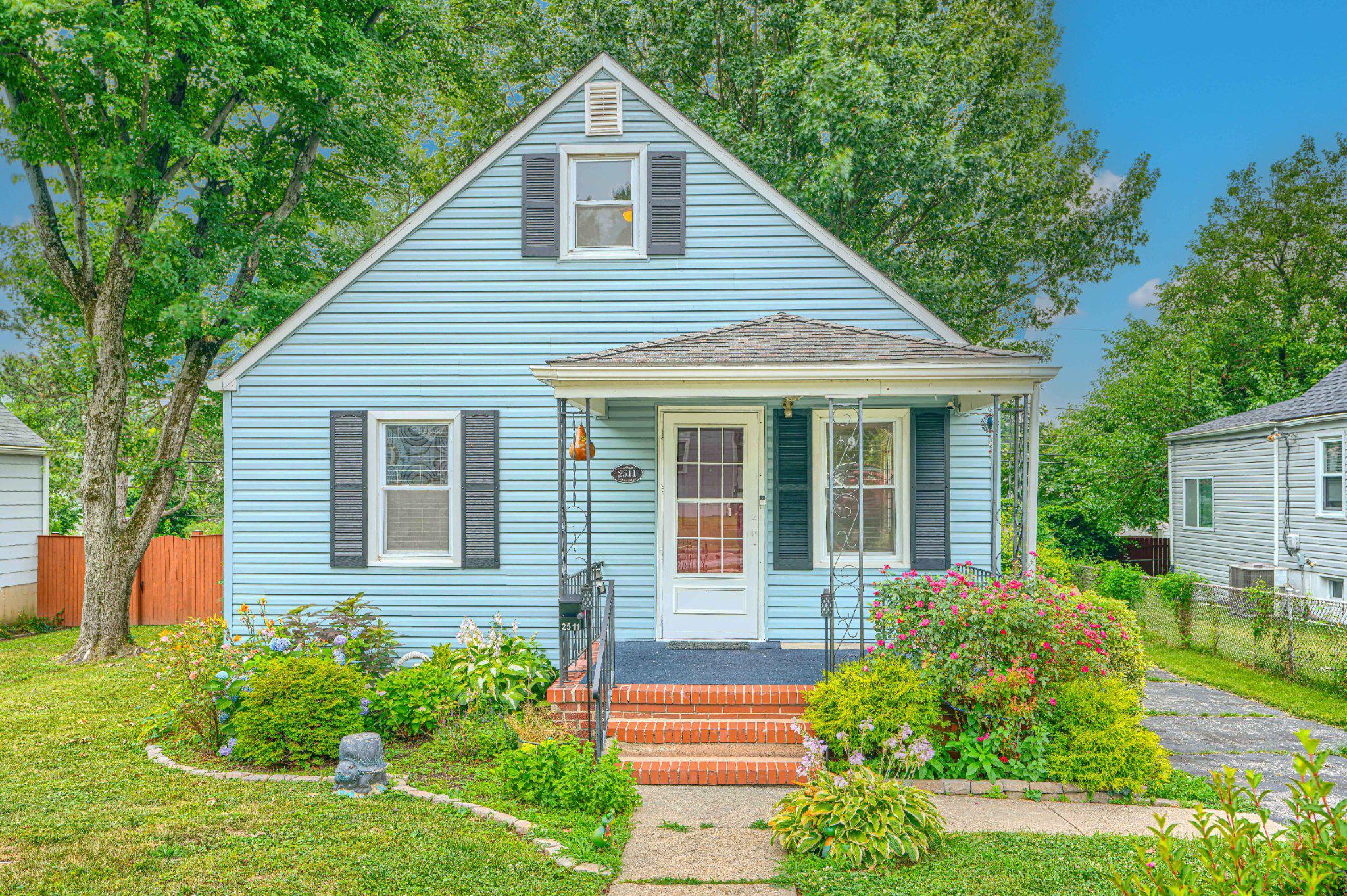 **BEST NEW LISTING IN PARKVILLE!**

This charming porch-front Cape Cod is move-in ready and loaded with updates! Enjoy  hardwood floors, carpet, plus updated siding, roof, and windows for added peace of mind. The bright and inviting main level features an open living and dining room combination, an updated kitchen with newer countertops, newer flooring, a newer stove, and stainless steel appliances, along with two generously sized bedrooms and a beautiful full bathroom. The upper level offers a private third bedroom and a separate sitting room, perfect for a home office, playroom, nursery, or additional living space. The finished lower level is ideal for entertaining, featuring a spacious club room with high ceilings as well as a large laundry/utility room with plenty of storage. Additional recent updates include a newer washer, a new sump pump, a hot water heater that is only 10 months old, and an HVAC system with the A/C unit replaced approximately five years ago. Step outside onto the rear deck overlooking a large, level, fully fenced backyard—perfect for entertaining, relaxing. A long private driveway provides ample off-street parking. Conveniently located near shopping, restaurants, parks, and major commuter routes, this beautifully home offers the perfect blend of character, comfort. Don't miss this exceptional opportunity—schedule your private tour today!