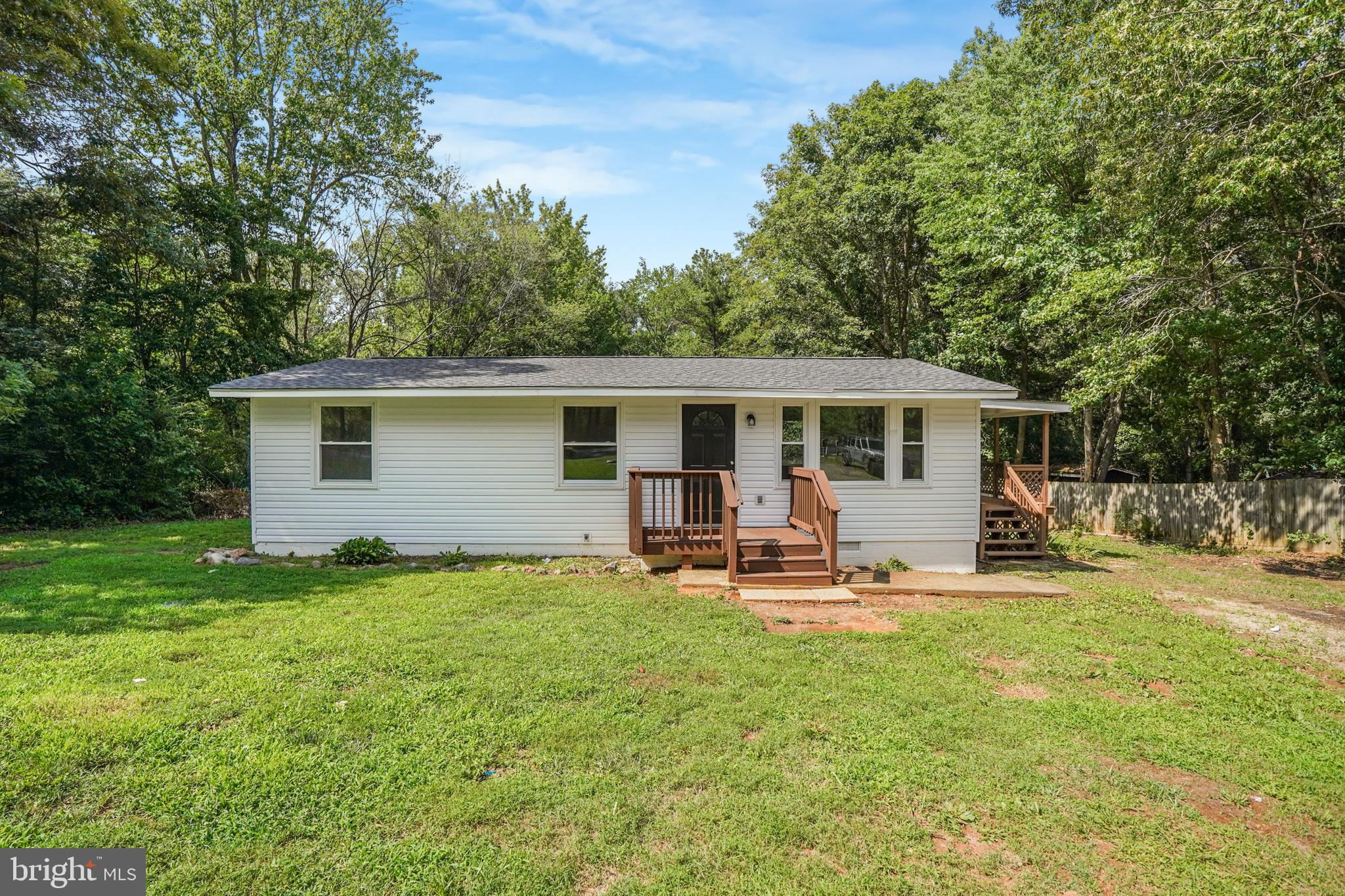 Fully Renovated Country Retreat in the Heart of Spotsylvania
Welcome to peaceful country living without the compromise! Perfectly situated in the heart of Spotsylvania County—right between the recreational beauty of Lake Anna and the historic charm of downtown Fredericksburg—this fully renovated 3-bedroom, 1-bathroom home at 11601 Post Oak Road offers a turn-key escape on a private 1.06-acre lot.
Boasting 960 square feet of thoughtfully updated living space, this 1979-built home beautifully marries solid, classic construction with modern peace of mind. Because it is completely move-in ready, this home is an absolute dream for first-time buyers, savvy buy and hold rental investors, or anyone looking to downsize while maintaining their freedom and land.
Step outside to discover your own personal oasis. With over a full acre of wide-open, usable space, the possibilities are endless. Whether you envision planting a sprawling garden, adding outbuildings, parking your recreational vehicles, or simply hosting outdoor gatherings in a quiet, rural setting, this property delivers. Recent updates and upgrades: septic system (2025); roof, windows, gray shaker kitchen cabinets with quartz countertops, farm sink, and stainless appliances, bathroom, LVP and carpet flooring, water heater, and much more.
Located in the highly desirable Post Oak area, you will enjoy a serene, tucked-away lifestyle surrounded by larger homesites, while still enjoying quick, convenient access to major commuter routes, shopping, and dining. It is the ultimate escape from the hustle and bustle!