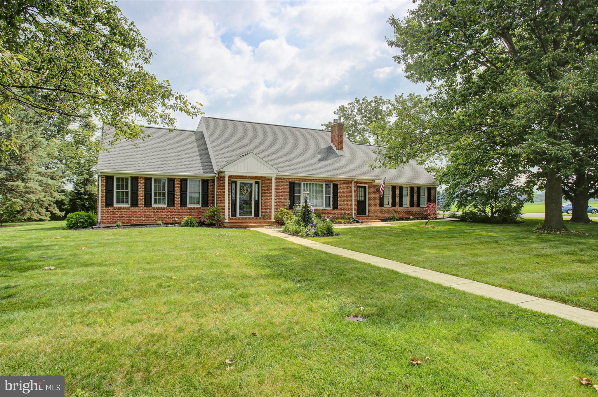 Welcome to 515 Starr Avenue, a meticulously maintained and extensively updated 3-bedroom, 2.5-bath Cape Cod situated on a desirable corner lot in a sought-after Chambersburg community. Offering the convenience of a first-floor primary suite with a private en-suite bath, a main-level half bath for guests, and a first-floor laundry room, this home provides flexible living options designed for everyday comfort.

Luxury vinyl plank flooring extends throughout the home’s living areas, while the kitchen, bathrooms, and laundry room feature ceramic tile flooring. The refurbished kitchen includes granite countertops, professionally refinished cabinetry, and a breakfast area for casual dining. A separate formal dining room provides additional space for entertaining, while the formal living room features a propane fireplace insert that serves as a warm and inviting focal point.

The finished lower level significantly expands the home’s living and entertaining space and includes a propane stove, working bar, and ample room for recreation, hobbies, a media room, game room, or additional gathering space.

Numerous improvements have been made throughout the home, including fresh interior paint, new siding installed in October 2025, a new hot water heater, LeafGuard gutter protection system, upgraded exterior faucets, landscaping enhancements, and kitchen updates. The current owners have taken exceptional pride in maintaining the property, and the attention to detail is evident throughout. Every aspect of the home reflects thoughtful care and ongoing maintenance, making this a truly turnkey property for its next owner.

Outside, the corner lot setting offers attractive curb appeal, mature landscaping, and beautiful mountain views from the backyard. Conveniently located near shopping, dining, schools, parks, and major commuter routes, this property combines functional living space, thoughtful updates, and a desirable location. Best of all, there is no HOA.