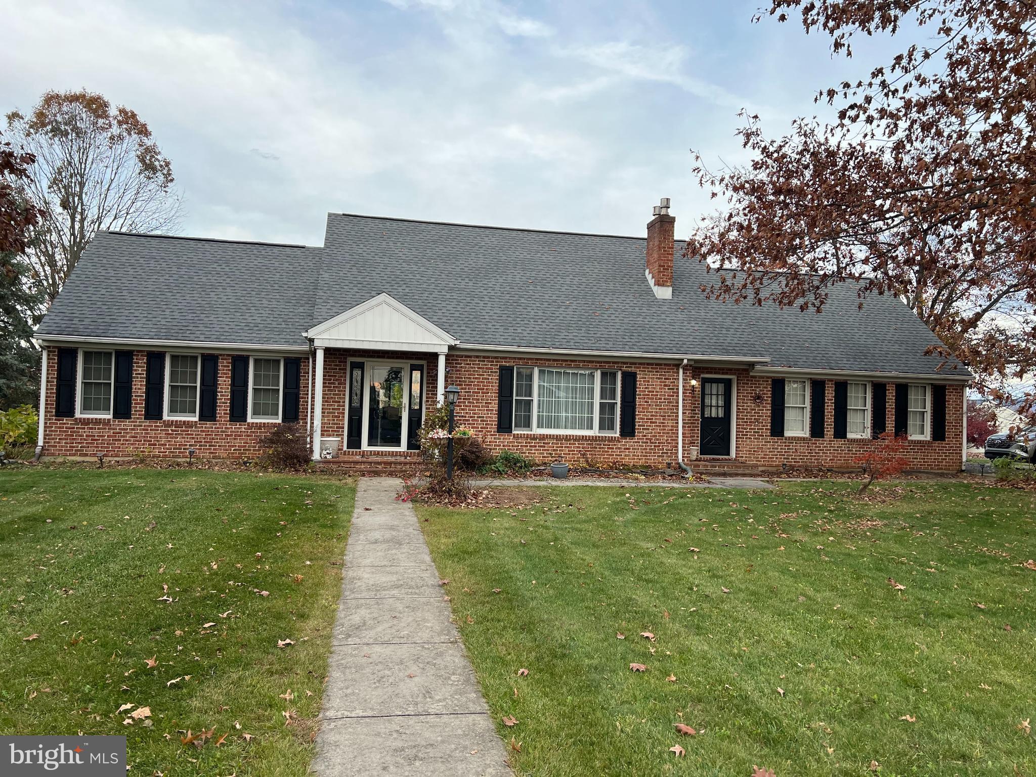 Welcome to 515 Starr Avenue, a meticulously maintained and extensively updated 3-bedroom, 2.5-bath Cape Cod situated on a desirable corner lot in a sought-after Chambersburg community. Offering the convenience of a first-floor primary suite with a private en-suite bath, a main-level half bath for guests, and a first-floor laundry room, this home provides flexible living options designed for everyday comfort.

Luxury vinyl plank flooring extends throughout the home’s living areas, while the kitchen, bathrooms, and laundry room feature ceramic tile flooring. The refurbished kitchen includes granite countertops, professionally refinished cabinetry, and a breakfast area for casual dining. A separate formal dining room provides additional space for entertaining, while the formal living room features a propane fireplace insert that serves as a warm and inviting focal point.

The finished lower level significantly expands the home’s living and entertaining space and includes a propane stove, working bar, and ample room for recreation, hobbies, a media room, game room, or additional gathering space.

Numerous improvements have been made throughout the home, including fresh interior paint, new siding installed in October 2025, a new hot water heater, LeafGuard gutter protection system, upgraded exterior faucets, landscaping enhancements, and kitchen updates. The current owners have taken exceptional pride in maintaining the property, and the attention to detail is evident throughout. Every aspect of the home reflects thoughtful care and ongoing maintenance, making this a truly turnkey property for its next owner.

Outside, the corner lot setting offers attractive curb appeal, mature landscaping, and beautiful mountain views from the backyard. Conveniently located near shopping, dining, schools, parks, and major commuter routes, this property combines functional living space, thoughtful updates, and a desirable location. Best of all, there is no HOA.