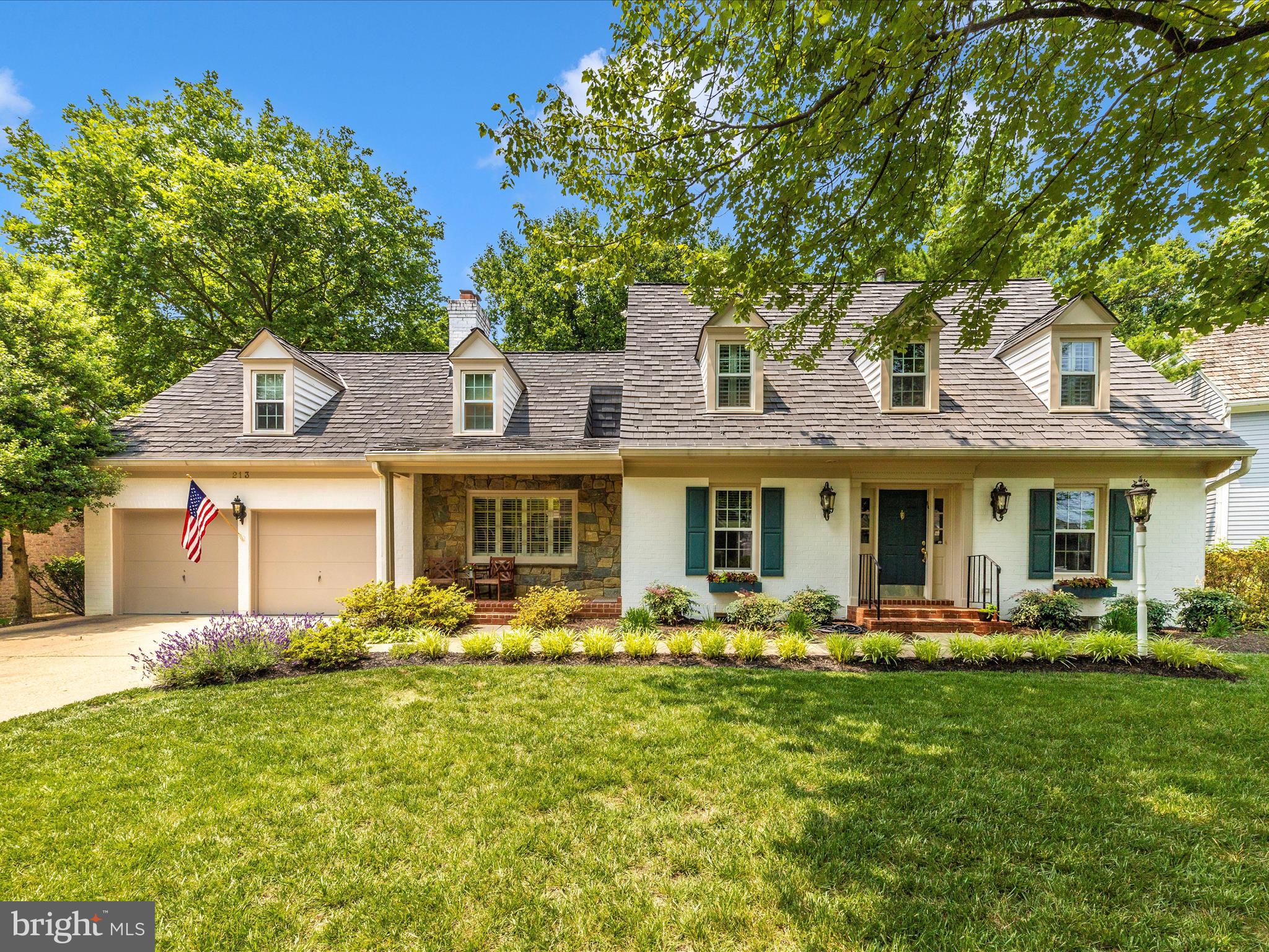 This is the opportunity you've been waiting for in the desirable Washingtonian Woods! Prepare to be captivated from the moment you arrive at this impeccably designed, rarely available Alfandre home loaded with stunning upgrades.

Step through the grand two-story foyer into the heart of the home. The updated gourmet kitchen is a chef's delight, featuring a farmhouse sink, quartz countertops, and a full suite of premier Bosch stainless steel appliances including a microwave drawer that preserves your valuable counter space. The adjacent family room invites you to relax by one of the home's FOUR fireplaces—this one a classic wood-burning centerpiece. Double doors open to your backyard paradise. The expansive deck, built with extra support for a hot tub, is your front-row seat to nature, as it backs directly to a protected, tranquil forest. Host memorable dinners in the stunning dining room, where the magnificent chandelier conveys, and the formal living room with its gas fireplace, elegantly accented with custom built-ins. A private, bonus room on this main level is finished with dentil molding and offers the perfect work-from-home solution.

You'll never want to leave your sanctuary upstairs—the expansive primary suite. This serene space features another gas fireplace (with the TV above it included), handsome built-ins, and an abundance of closet space, in addition to the large walk-in. The lavish primary bath is a true spa experience, boasting a steam shower with an overhead skylight and a dual sink vanity. Three more bedrooms, a full bath, and a convenient laundry room complete this level.

The fully finished, walkout lower level is a vast space that includes a fourth fireplace (wood-burning), a fifth bedroom, and multiple bonus rooms ready to become your home gym, media room, or play area. There are also two more full baths on this level, one with a tub and one with a standing shower. This meticulously maintained home features significant recent upgrades, ensuring comfort and efficiency for years to come: new wide-plank walnut hardwood floors across the first floor, stairs, and second-level hall; newer, energy-efficient windows and glass doors; a durable 50-year slate-look roof (only 15 years old); and dual-zone HVAC systems and two gas water heaters.

This exceptional property is a rare find and will not last long. Schedule your private tour today!