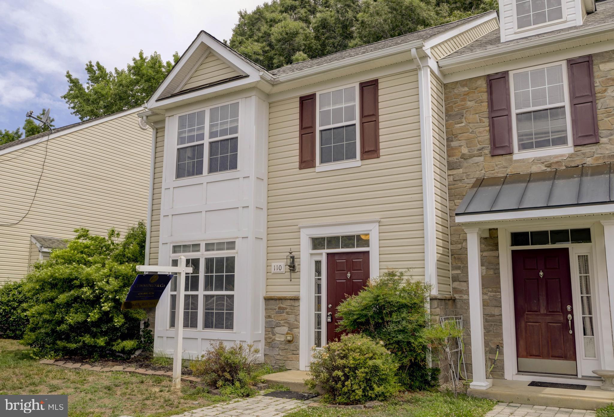 Rarely available and beautifully updated, this spacious 3-bedroom, 2.5-bath end-of-group townhome offers the perfect combination of comfort, privacy, and convenience. A desirable two-story extension creates an expansive floor plan, highlighted by a luxurious primary suite featuring a stunning super bath designed for relaxation. Freshly painted throughout and featuring brand-new carpeting, this move-in-ready home welcomes you with warm and inviting living spaces, including a cozy gas fireplace perfect for cool evenings. Step outside to enjoy the private rear yard with a charming paver patio backing to mature trees and wooded open space, providing exceptional privacy and a peaceful natural setting. Ideally located close to Cambridge's shopping, dining, and local attractions, this home also offers easy access to Delaware and Maryland's beautiful Eastern Shore beaches, making weekend getaways a breeze. Whether you're looking for a primary residence or a low-maintenance retreat, this exceptional home is one you won't want to miss.