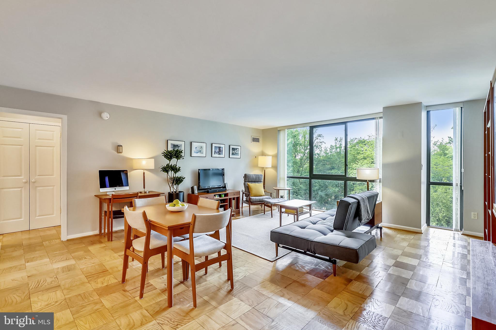 Beautiful and sun-filled, 2 bedroom, 1.5 bathroom condo in a fantastic building! Walk inside and you ll find a lovely, updated, eat-in kitchen with white cabinets and granite countertops. The gorgeous kitchen opens up to a large living area with stunning floor-to-ceiling windows overlooking the park. Make your way to the master suite to find a large bedroom with ample room for a king sized bed and an enormous, walk-in closet with built-ins! Other features include hardwood floors throughout, updated bathrooms, washer/dryer in the unit, 1-car garage parking, and extra storage unit. All utilities are included in the condo fee. Smoke-free building with great amenities including 24-hr front desk/concierge, heated outdoor swimming pool, sauna, fitness center, library, and party room. 4620 N. Park is perfectly situated within walking distance to the Metro, Whole Foods, restaurants and shopping. This view is hard to come by   don t miss out on this one! **Please excuse the construction of the driveway, entrance, lobby, and hallways as the building is undergoing a major renovation. Will be lovely when finished!