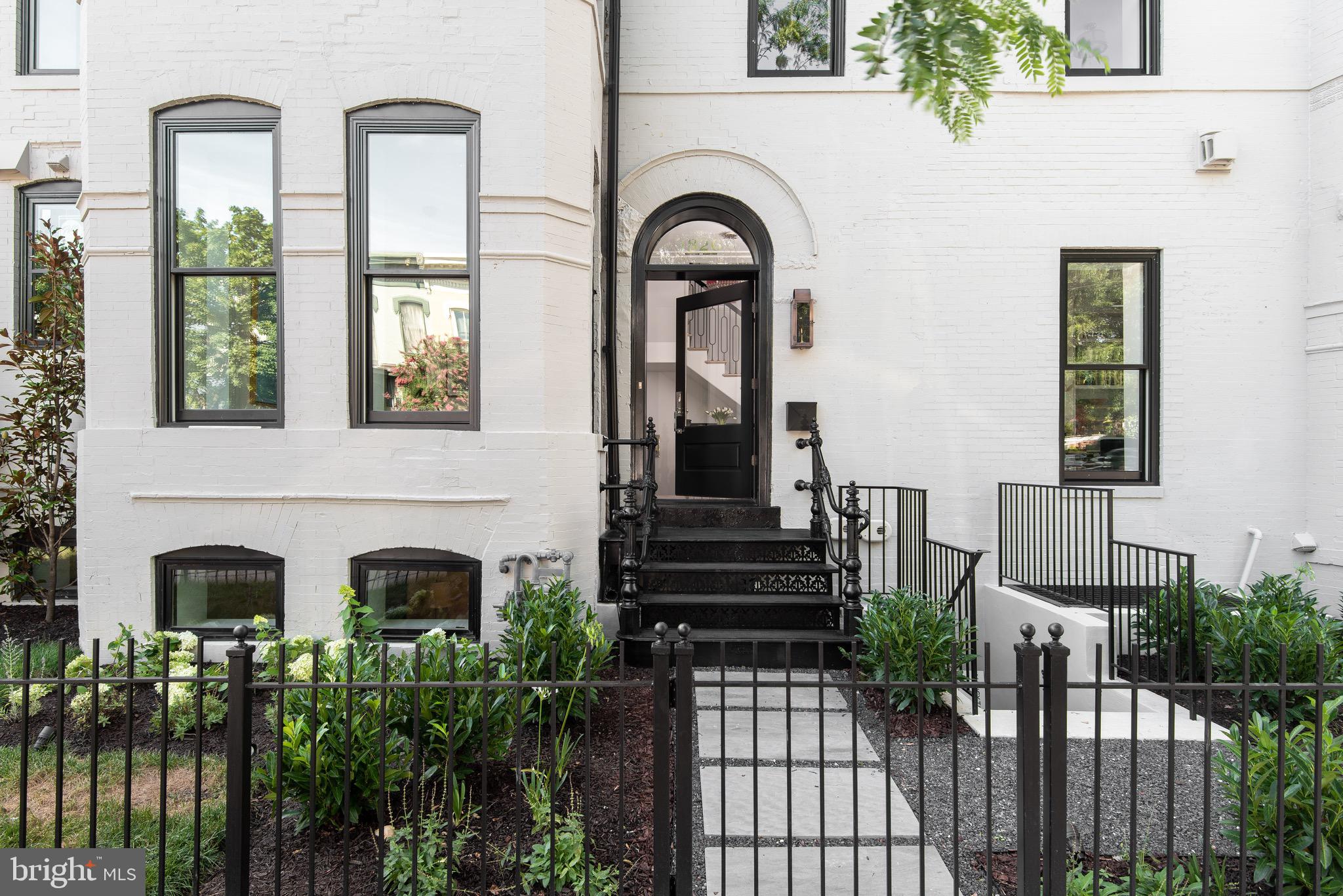 New Price! We're excited to relaunch this stunning Logan Circle home. The developer spent several weeks carefully redesigning the dining room, and opening up the kitchen to create a wonderful entertaining space for family and friends.  The listing was named "House of the Week," by The Washington Post. Prepare to be amazed. A luxuriously designed, light-filled magnificent single family residence by Lot Squared Development in DC s Logan Circle Neighborhood. This stunning corner block Victorian sits a short walk to the shops and restaurants of 14th Street and lively entertainment offered along the U Street Corridor. The house design showcases the original 1906 Victorian architecture including large window lined turrets soaking the home in sunlight. The interior of the home has been completely rebuilt and tastefully modernized with living and entertaining in mind. Over 4200 SF, elevator serving all floors, private secured parking, and breathtaking rooftop views.