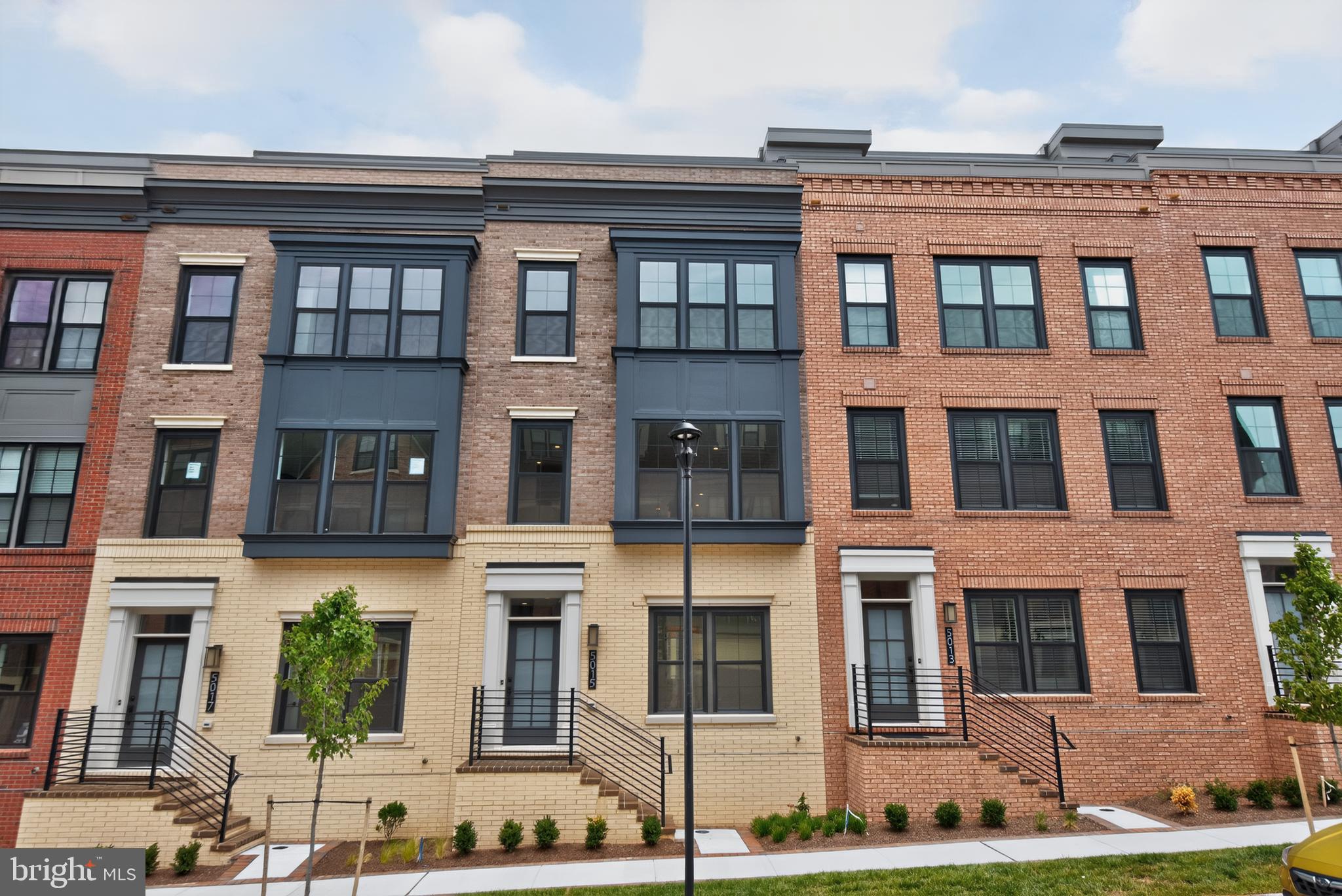 An exceptional opportunity to own a never-occupied luxury brownstone in North Bethesda's highly desirable Strathmore View community. Freshly completed and just settled, this stunning four-level residence offers the rare advantage of brand-new construction with immediate availability—no construction timeline, no waiting, and no previous occupants.

Designed for today's lifestyle, the thoughtfully crafted floor plan offers approximately 2,345 square feet of beautifully finished living space, four spacious bedrooms plus a versatile loft and flex space that can easily serve as a home office, guest suite, fitness studio, media room, or additional sleeping area to fit your needs. A two-car garage and private rooftop terrace complete this exceptional home, creating the perfect setting for both everyday living and entertaining.

The chef-inspired kitchen anchors the home with premium finishes, an oversized island, abundant cabinetry, and seamless flow into the spacious dining and living areas. Expansive windows, soaring ceilings, and sophisticated designer details fill the home with natural light while flexible living spaces adapt effortlessly to today's evolving lifestyles.

Ideally located in the sought-after Strathmore View community, residents enjoy beautifully landscaped green spaces, walking paths, a neighborhood park, and unparalleled convenience just moments from the Music Center at Strathmore, Grosvenor-Strathmore Metro, Pike & Rose, Rock Creek Park, premier shopping, dining, and major commuter routes. Experience the rare combination of pristine, never-lived-in luxury and immediate move-in convenience in one of North Bethesda's most desirable communities.