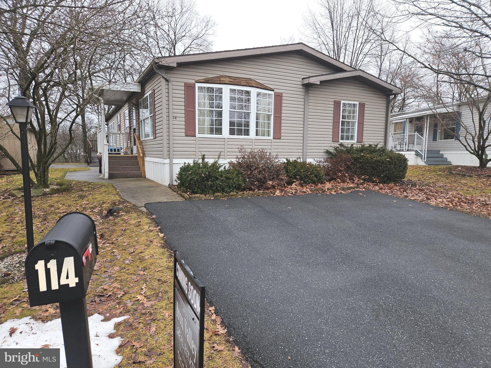 Dont miss out on this Lovely 3 bedroom 2 bath manufactured home in Country Manor.  This is a 55+ community located in a rural setting in West Hanover township about 10 minutes from Lower Paxton.   This is one of the larger homes in the neighborhood with possible the best setting backing up to trees overlooking a stream with wildlife.  The homesite has one of the larger yards in the neighborhood and easy to manage.  When you arrive, you will notice 2 parking spaces and a few steps leading up the home (there is also a ramp at the rear).  Enjoy the warm comfort with efficient gas heat and central air for the warmer months.  This home has been well maintained and the taxes are low. Must be park approved!  Schedule your showing today and please ask your agent to send you the Youtube video tour of the complete walk through. All appliance are included.  SERIOUS BUYERS ONLY, PARK RULES REQUIRE SOMEONE IN THE HOUSEHOLD MUST BE AGE 55 OR OLDER, YOU CAN HAVE 1 SMALL LAP-SIZE PET 10 lbs or SMALLER, MONTHLY LOT RENT IS $616 AND INCLUDES WATER.