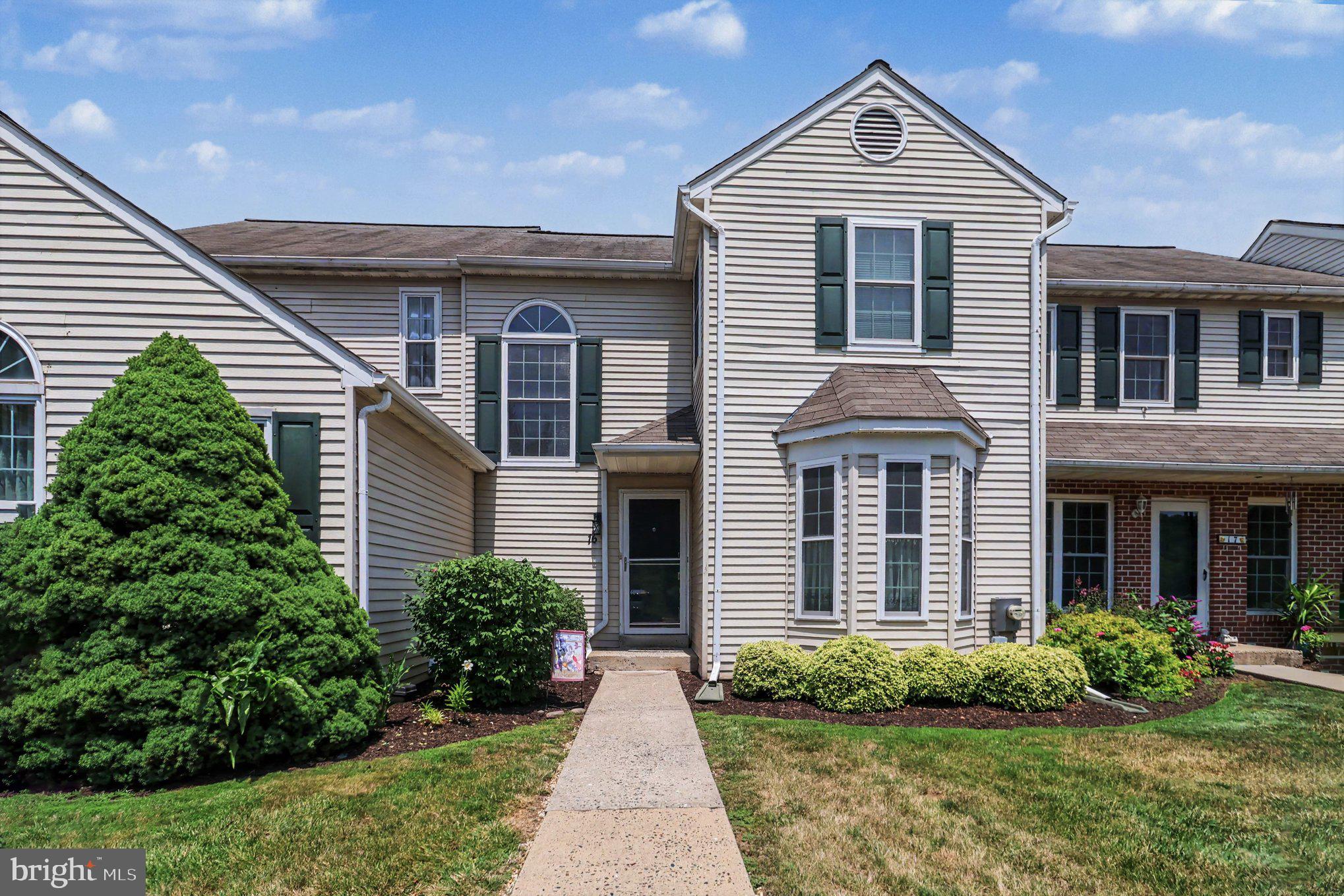 Welcome to 16 Village Drive, a beautifully maintained townhouse in the desirable Spring Mount community that offers comfortable living, thoughtful updates, and inviting indoor and outdoor spaces. A welcoming foyer with a convenient powder room leads into an open-concept living and dining area, where gleaming hardwood floors, oversized windows, and a cozy wood-burning fireplace create the perfect setting for everyday living and entertaining.
Sliding glass doors open to a beautiful paver patio, providing an ideal space for outdoor dining, summer barbecues, or simply relaxing while enjoying the peaceful surroundings. The spacious eat-in kitchen offers abundant cabinet and counter space along with three large windows that bring in natural light and scenic views of Spring Mount.
Upstairs, you'll find two spacious bedroom suites, each with its own private full bathroom for added comfort and convenience. The primary suite features a large walk-in closet and ceiling fan, while the second suite also includes a ceiling fan and private bath. The finished basement expands the home's living space with endless possibilities for a family room, media room, home office, fitness area, or playroom, while still offering dedicated laundry and utility space. A brand-new heater and central air conditioning system provide added peace of mind just in time for Summer.
Conveniently located just minutes from the Spring Mountain Adventure resort, the Perkiomen Trail, Green Lane Park, and the charming shops and restaurants of Schwenksville and nearby Collegeville, this home offers easy access to outdoor recreation, dining, and everyday conveniences. Commuters will also appreciate the proximity to Routes 29, 73, 113, and 422, making travel throughout Montgomery County simple and convenient.