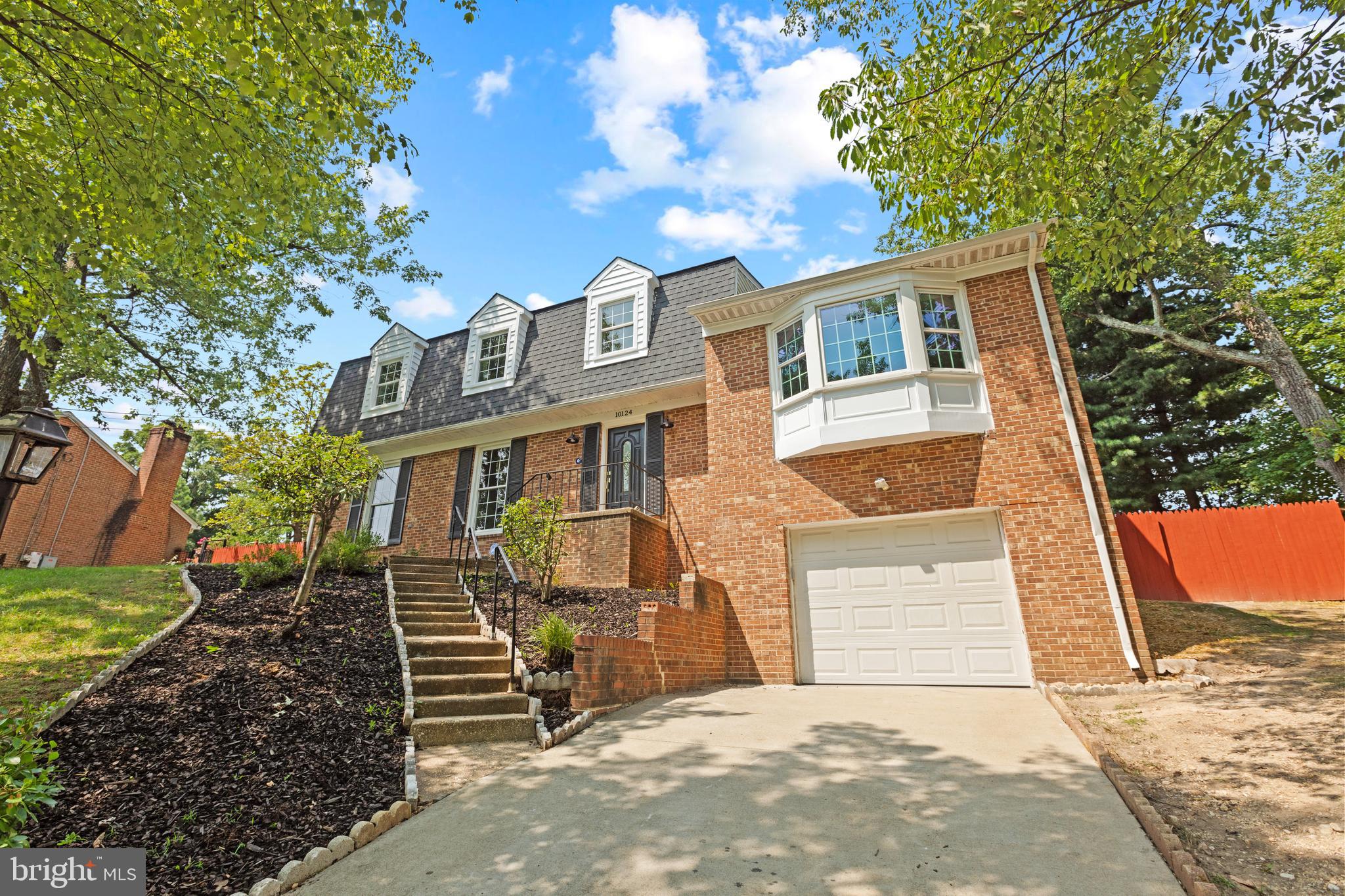 Fall in love with this beautifully renovated Dutch Colonial, offering over 4,100 square feet of timeless charm and modern updates! With six spacious bedrooms and 3.5 baths, this home is designed for both comfort and functionality.  Step inside to a welcoming foyer that leads to multiple versatile living spaces, including a formal living room and a cozy sitting room off the kitchen. Gleaming real hardwood floors and abundant natural light flow throughout the entire home, enhancing its warmth and elegance.  The expansive, open-concept kitchen is a chef’s dream, featuring soft-close white shaker cabinets, 42-inch uppers, brand-new stainless steel appliances, quartz countertops, and a large island with ample storage—perfect for both cooking and entertaining. Just off the kitchen on the second level, you’ll find a spacious laundry room with a full-size washer and dryer for added convenience.  Beside the kitchen, a one-of-a-kind entertainment room awaits, showcasing stunning architectural wood beams, a striking gas fireplace, and elegant French doors that open to a generous deck. The fully fenced backyard provides a private retreat, large enough to accommodate a hot tub and endless outdoor fun.  Upstairs, you’ll find four well-appointed bedrooms and two bathrooms, including a spacious primary suite with a newly renovated bath and enough room to comfortably fit a California king bed.  Each bedroom features hardwood floors and a fresh paint job and updated light features. The updated hallway bathroom serves the additional bedrooms with style and convenience.  The finished basement adds even more living space, complete with additional bedrooms and a full-size bathroom—ideal for guests, a home office, or a private retreat.   This stunning home seamlessly blends classic elegance with modern comforts—don’t miss your chance to make it yours!
