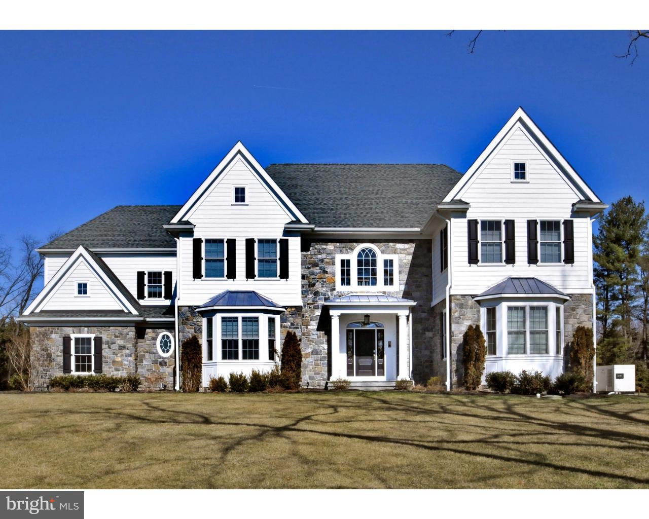 Exciting opportunity to purchase a resale in WICKERFIELD ESTATES, situated on over 2 acres on one of the best lots in this Blue Bell enclave of amazing custom Manor Homes. This Outstanding 6 Bedroom, 9-Year-Old Stone Colonial with 4-CAR GARAGE & over 7500 sq ft including the Finished Daylight Basement with IN-LAW SUITE, built by Bentley Homes, has an open floor plan and fantastic upgrades throughout, including hardwood floors, 9' ceiling on both floors, custom millwork and high-end finishes. This SMART HOUSE features "Control 4" computer screens in most rooms to control music, TVs and security with all equipment included.  The spacious formal Dining Room features crown molding & a walkout bay window. The Living Room, Family Room & Kitchen are all open to each other for amazing entertaining flow. The formal Living Room offers the 1st of 3 gas fireplaces and the gorgeous Family Room provides the 2nd fireplace, coffered ceiling, wall-mounted TV & 2 sets of French doors providing exterior access. The Chef's DREAM KITCHEN is exquisite, featuring granite counters on the island & perimeter, stainless Bosch double wall ovens, microwave drawer, Wolf 6-burner commercial stove w/grill & hood, tiled backsplash, glass cabinets & Breakfast Room with French door accessing the rear of the property. A French door from the Living Room opens to the STUDY w/custom bookshelves. 2 Powder Rooms & a large MUD ROOM with back staircase complete the 1st floor. The PRIMARY RETREAT offers a Sitting Room with 3rd fireplace, gorgeous bedroom w/tray ceiling, 2 professionally organized walk-in closets & a luxurious Full Bath w/marble counters, soaking tub & Spa-Shower with multiple shower heads. 4 additional bedrooms feature en-suite Full Baths including 1 Jack and Jill. The 2nd Floor Laundry Room includes the washer and dryer plus built-ins and sink. The Daylight Lower Level includes an extra-large Recreation Room, 6th Bedroom/In-Law/Au-Pair Room w/nearby Full Bath, Playroom or 2nd Office & Gym w/rubber floor plus ample storage. Flagstone steps lead from the Family Room to the beautiful, tree-lined rear yard w/ample impervious surface available for a pool. Other excellent features include a whole house generator & 6 zones of HVAC.  Located within highly rated Wissahickon School District & close to excellent private schools; minutes from the town of Ambler w/train to center city, & easy access to major routes, great shopping & restaurants. NO NEED TO BUILD- this SMART HOUSE awaits!!