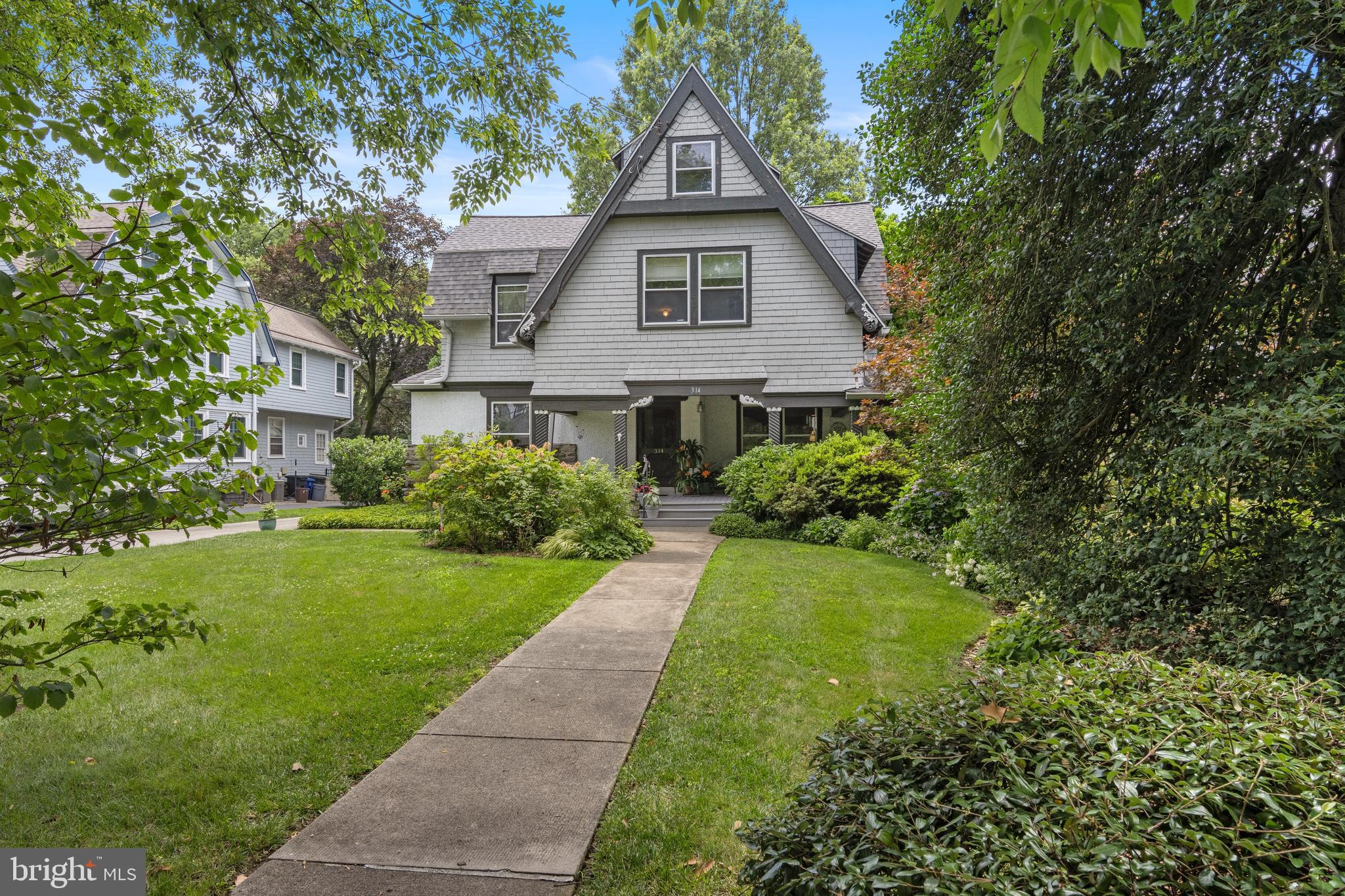 Nestled in the heart of historic South Wayne, this charming c.1891 Arts & Crafts residence seamlessly blends timeless charm with modern comforts. Spanning 3,362 square feet on a .35-acre lot, the home boasts 6 bedrooms and 2.5 bathrooms, offering ample space for gracious living. 
Step onto the inviting wrap-around covered porch—perfect for relaxing or entertaining—and enter a world of classic craftsmanship. Inside, you'll find original millwork, a built-in bench, and rich wood floors that exude warmth and character. The main level features a spacious Living Room with large windows, a formal Dining Room with a door to the rear yard, and a Den with built-in bookshelves.  The Kitchen has neutral cabinets and is adjacent to a spacious Laundry/Mudroom, offering space for expansion. 
Upstairs is the Primary Bedroom with an en suite Full Bathroom and an adjoining Office/Nursery, presenting an excellent opportunity for future expansion of the primary suite. 3  add’l Bedrooms share a hall Bath with a tub/shower combo. The 3rd floor offers two more Bedrooms and a versatile Bonus Room. The flexible floor plan provides ample space for a Playroom, Office, and Exercise area.  A 3rd full Bathroom could be added to this level with relative ease, as the Bonus Room is directly above the 2nd floor Hall Bath. 
Recent updates include a newer roof (2022), two-zone central air conditioning (2018/2019), new composition deck on the front porch (2012), and upgraded electrical system, ensuring modern reliability. Located within walking distance to shops, restaurants, schools, parks, and train stations, this home offers unparalleled convenience. Situated in the highly ranked Radnor School District, this home has easy access to the Blue Route, Center City, medical/corporate centers, and the Airport. Enjoy local events like South Wayne Porchfest, the Wayne Music Festival, Radnor Fall Festival, and Wheels of Wayne from this rare gem in a highly sought-after neighborhood!