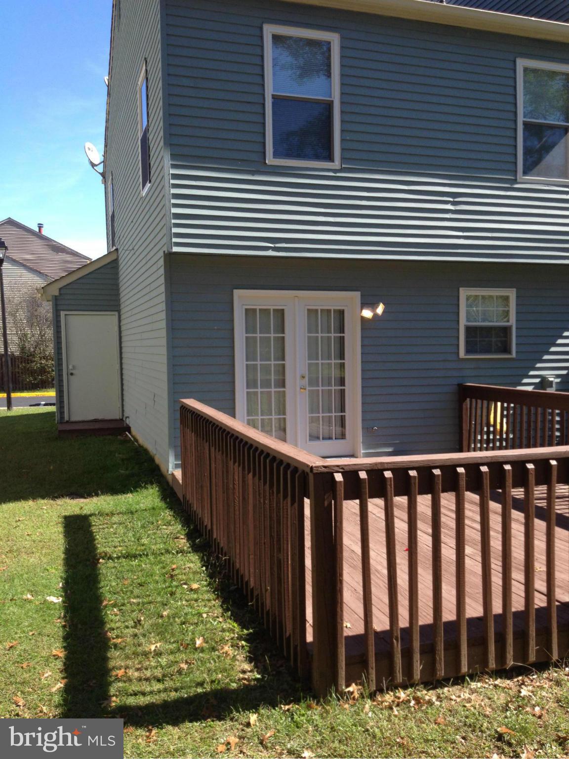 End unit TH freshly painted both in and out.  New carpet.   Wood laminate floors 1 year old.  French doors to deck.  HE stackable W/D.  Own for less than renting with $0 down.  Rent for $1300, own for $911.  Will be out of country 11/28 to 12/15.  Call CSS for showings.  Contact owner via email.