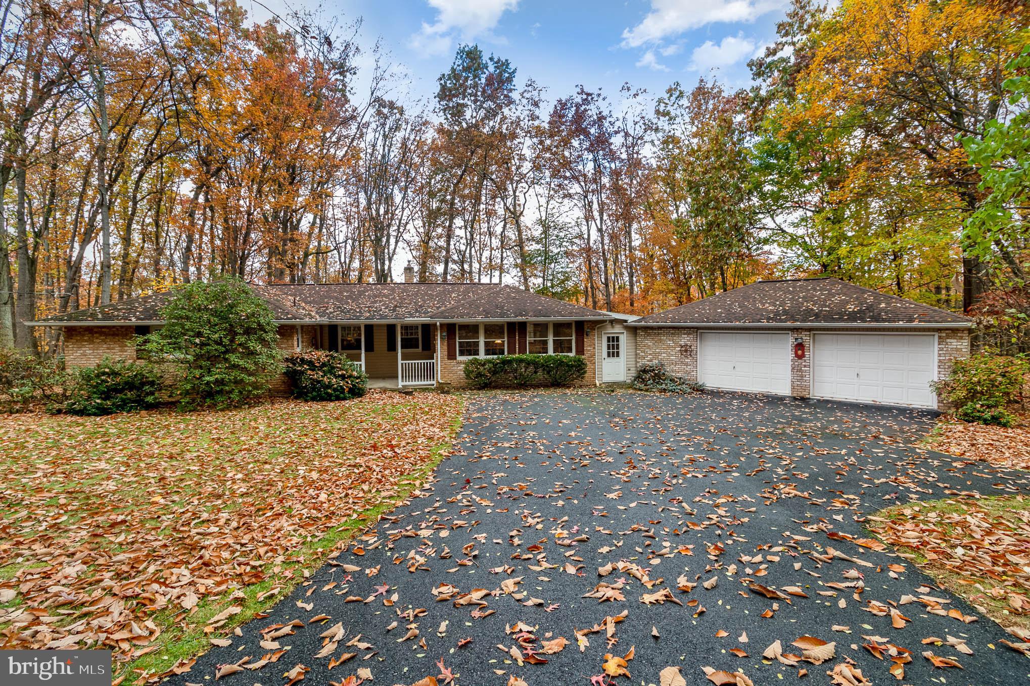 This gorgeous home sits on one acre in the White Rock Acres community.  The large lot supports a mature landscape with plenty of opportunity to witness wildlife.  The home offers a dine in kitchen, family room, formal living room along with three bedrooms, two full baths, and a bonus room off the kitchen.  The unfinished basement provides plenty of storage space or the option to finish for additional living space.  Enjoy grilling outdoors on the deck off the family room!  Schedule a viewing on this property today!