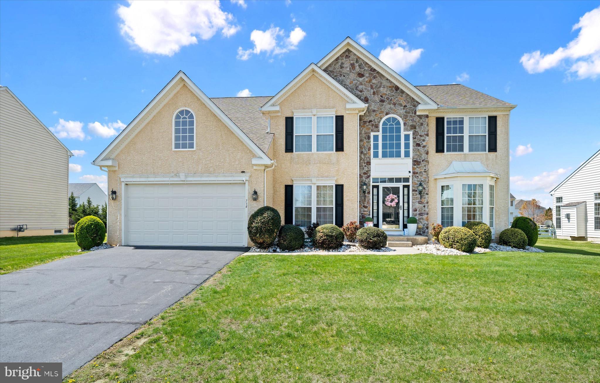 Welcome to 734 Wood Duck Ct, an exceptional residence nestled in the heart of Middletown within the sought-after community of Dove Run. From the moment you arrive, you’ll be captivated by the home’s elegant curb appeal, highlighted by refined stone accents and meticulously maintained landscaping.
Step inside to discover a grand two-story turned staircase and rich hardwood flooring that flows seamlessly throughout the main level. Just off the entry, the formal living room offers a bright and versatile space, ideal for refined entertaining, a quiet sitting area, or a stylish home office. Across the foyer is the formal dining room - perfect for hosting intimate dinners and special occasions. Further into the home, the dramatic two-story family room impresses with soaring ceilings, an abundance of natural light, and a striking fireplace that serves as the centerpiece of the space. Moving into the heart of the home - the gourmet kitchen is thoughtfully designed for both everyday living and entertaining. It features dual ovens, a spacious center island, granite countertops, a designer backsplash, stainless steel appliances, recessed lighting, and upgraded cabinetry. Expansive windows bathe the space in natural light while maintaining an open, inviting connection to the living areas. Also on the main level is the spacious laundry room with access to the garage. Down the hall, you’ll find a full bathroom and an additional room that can be used as an office, gym, or playroom. Step outside to the custom brick patio, surrounded by beautiful landscaping and bushes, complete with a built-in fireplace—perfect for entertaining while still offering plenty of space for gatherings. Upstairs, you’ll find four spacious bedrooms, each equipped with a ceiling fan and ample closet space, along with a center hall bathroom. The primary bedroom welcomes you through double doors and features an en-suite bathroom with marble tile, a glass shower, soaking tub, and double vanity. The unfinished basement provides a blank canvas for future customization, whether you envision a home theater, wine cellar, or additional living space. 
Other features inc2 car- garage, Dual HVAC system, and a newer roof.Located in the Appoquinimink School District, this home is close to all the shopping and entertainment Middletown has to offer- perfect blend of comfort and location.Schedule your  showing today and experience all that this remarkable home has to offer.