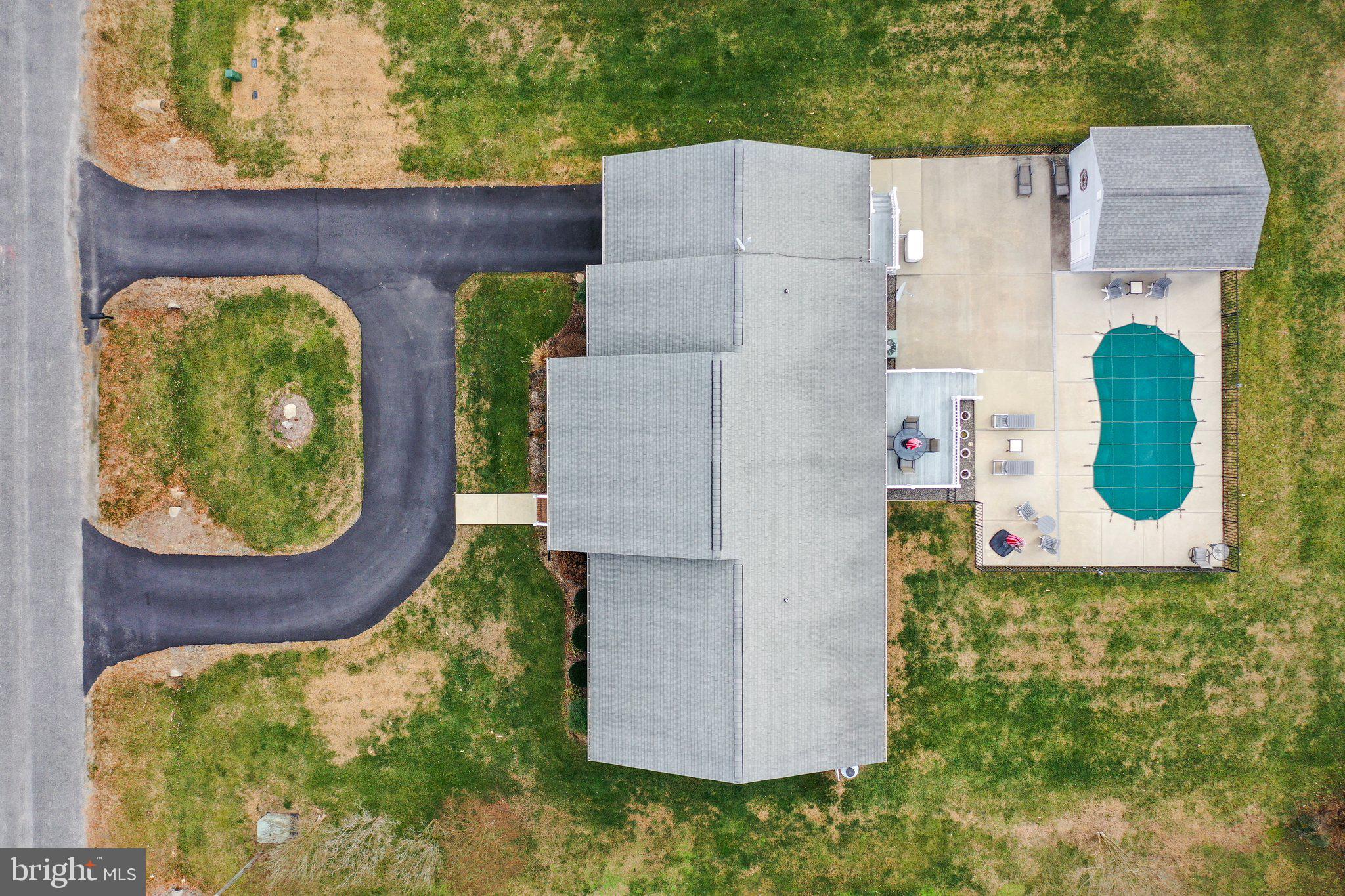 This brick ranch home is a rare find in town, featuring its very own 25' x 11' in-ground saltwater pool! The home features 3 spacious bedrooms, 2.5 baths, a large living room equipped with gas logs, versatile bonus room, kitchen, laundry room, attached one-car garage, and a large covered front porch. The primary bedroom features a custom walk-in tile shower provided with a lifetime warranty. An additional feature is the whole-house generator. Whether you're relaxing on the back deck or patio, hosting poolside gatherings, or enjoying a quiet evening swim, the outdoor space is built for enjoyment. Make this your home just in time for summer fun!  *1 Year Home Warranty Included*