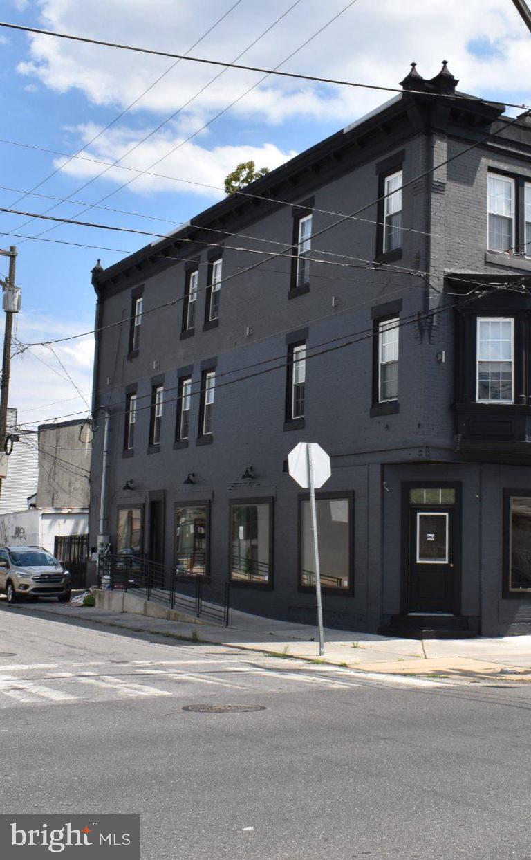 This multi-unit property, located in the desirable Philadelphia (West) area, was renovated in 2022 and maintained, enhancing its appeal and functionality. Built in 1925, the structure has been updated to a very good condition, making it a prime investment opportunity. The property features a corner lot, providing excellent visibility and accessibility, which is crucial for attracting foot traffic. In addition to commercial space that is currently rented, you have 2 -Two bedroom apartments that are currently occupied. Washer & Dryer for easy laundry in each unit, Filter water system, and much more in apartments. Nestled in a prime location, ideally situated for those seeking the perfect balance of  urban convenience and residential tranquility. Countless shops, restaurants, grocery-stores, and more within a few blocks radius. The location benefits from proximity to public transportation, with a bus stop and train Market / Frankford Line station both less than a mile away, ensuring ease of access for clients and employees alike. Investors will appreciate the potential for strong returns in this area, driven by ongoing development and demand for commercial spaces. The property is situated in a vibrant neighborhood, making it ideal for various business ventures. On-street parking is available, enhancing convenience for visitors. This property not only represents a solid investment but also offers the opportunity to capitalize on the growing market trends in Philadelphia. Don't miss the chance to add this valuable asset to your portfolio.