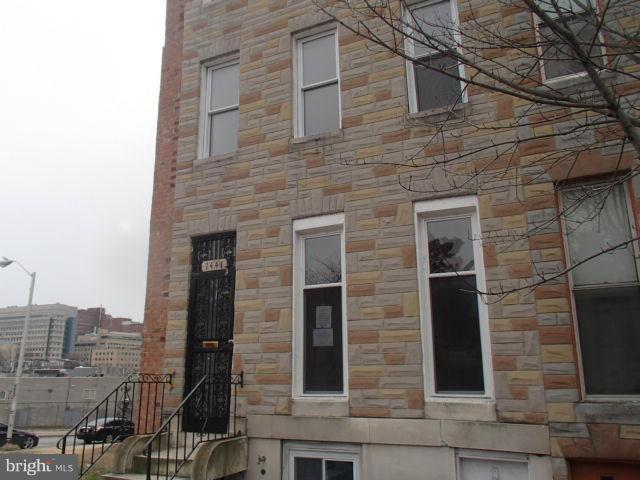 HUD Owned Home, case number 241-872377.  HUD Homes are sold "as is,"  FHA insurable with repair escrow, subject to appraisal. Fantastic opportunity to own this value priced end unit townhouse!  Enjoy bright, spacious room sizes, four bedrooms and three full baths!  Put your finishing touches on the basement for additional living and storage space. Convenient downtown  Baltimore location.