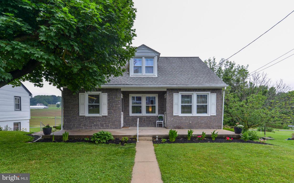Quiet country location, 1.5 story home with first floor bedroom and full bath. Beautiful pine wood floors, updated kitchen with breakfast bar. Lots of storage and closets on the second floor with two additional bedrooms and 1/2 bath. New central air, nice backyard, walk-out basement with a 1 car garage.